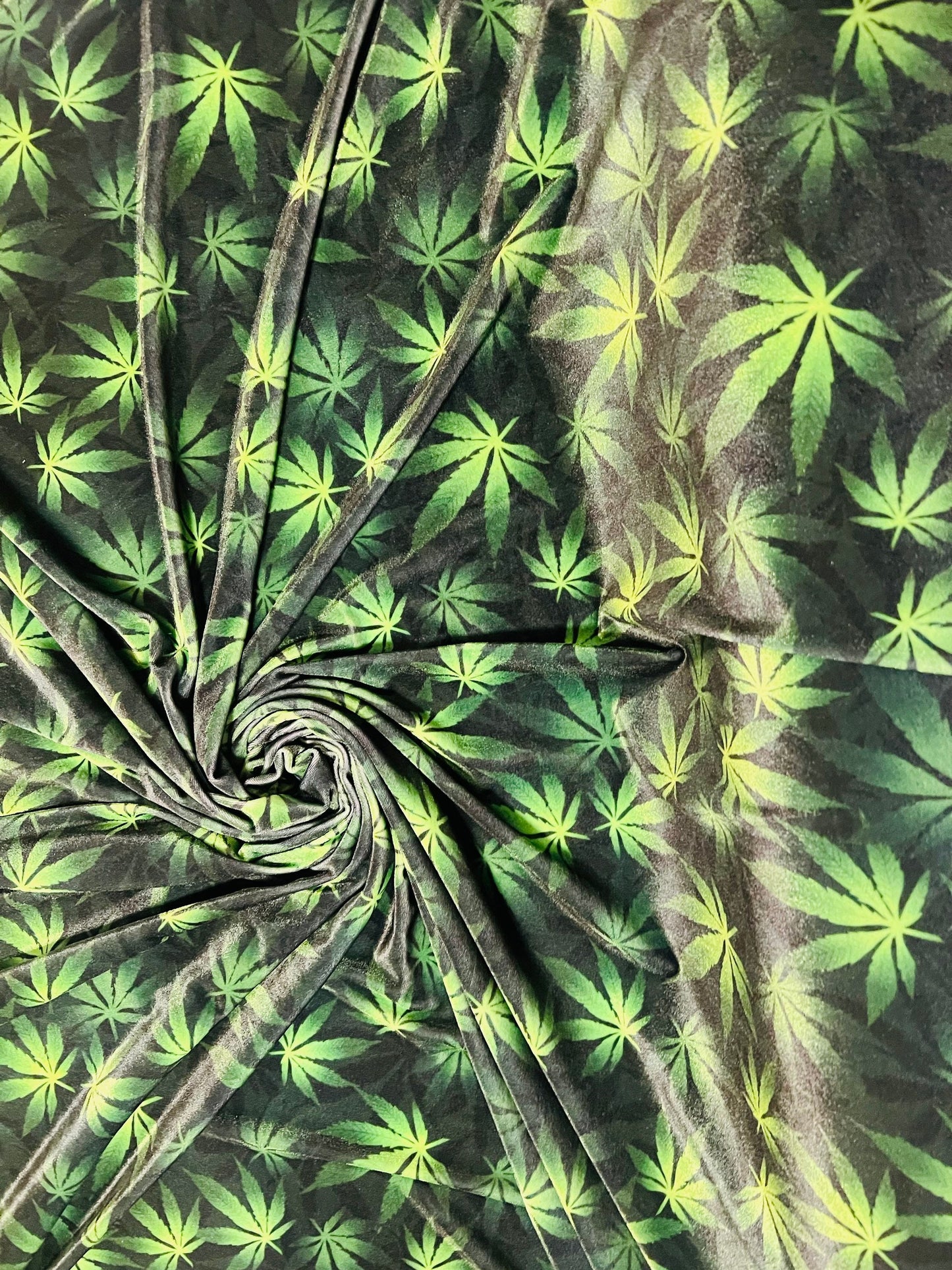 New cannabis leaf print on great quality of stretch velvet 4/way stretch 58/60” sold by the YD.ships worldwide from Los Angeles California.