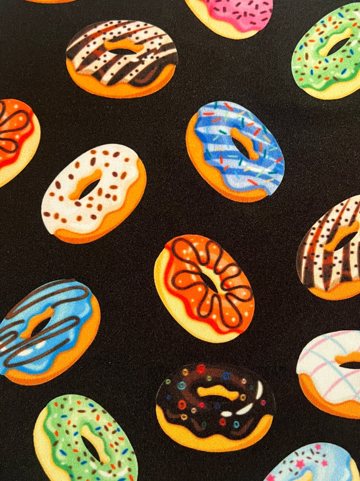 Sweet donuts design print on the best quality of nylon spandex 4-stretch 58/60 sold by the YD.ships worldwide from Los Angeles C A USA.