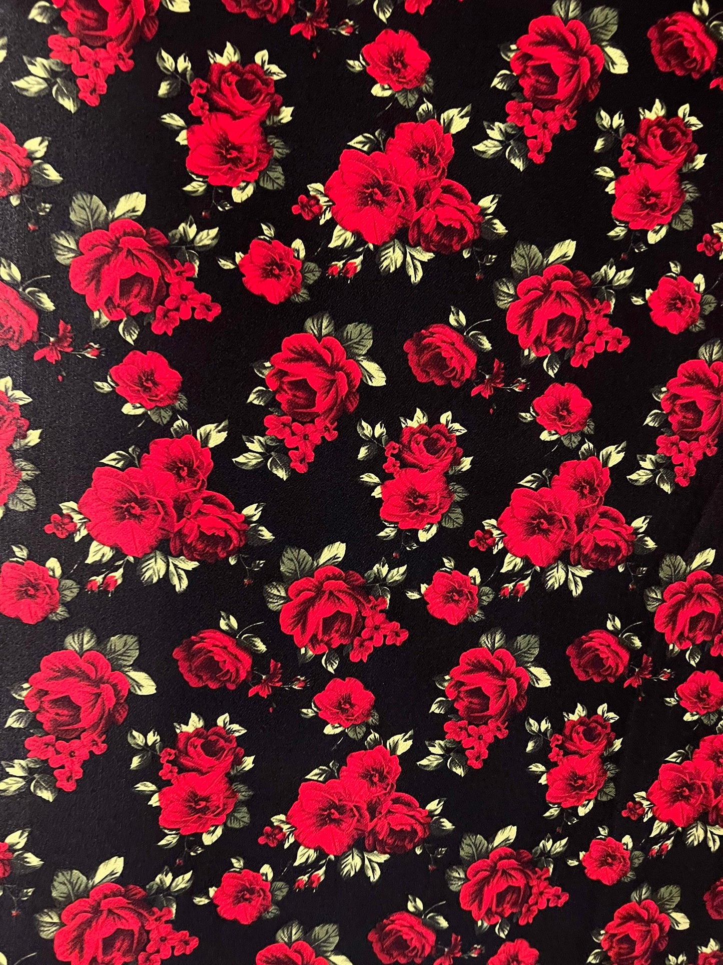 Red roses garden design print on poly spandex 4-stretch 58/60”sold by the YD. Ships worldwide from Los Angeles California USA.