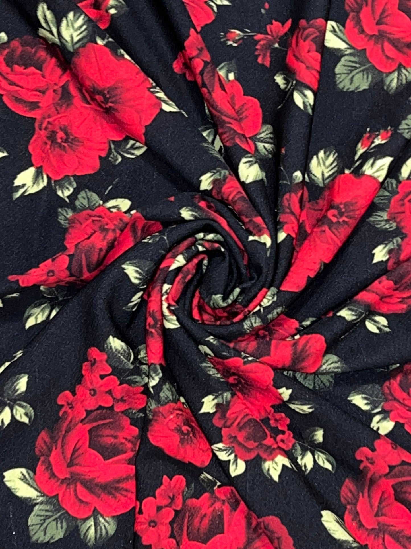 Red roses garden design print on poly spandex 4-stretch 58/60”sold by the YD. Ships worldwide from Los Angeles California USA.