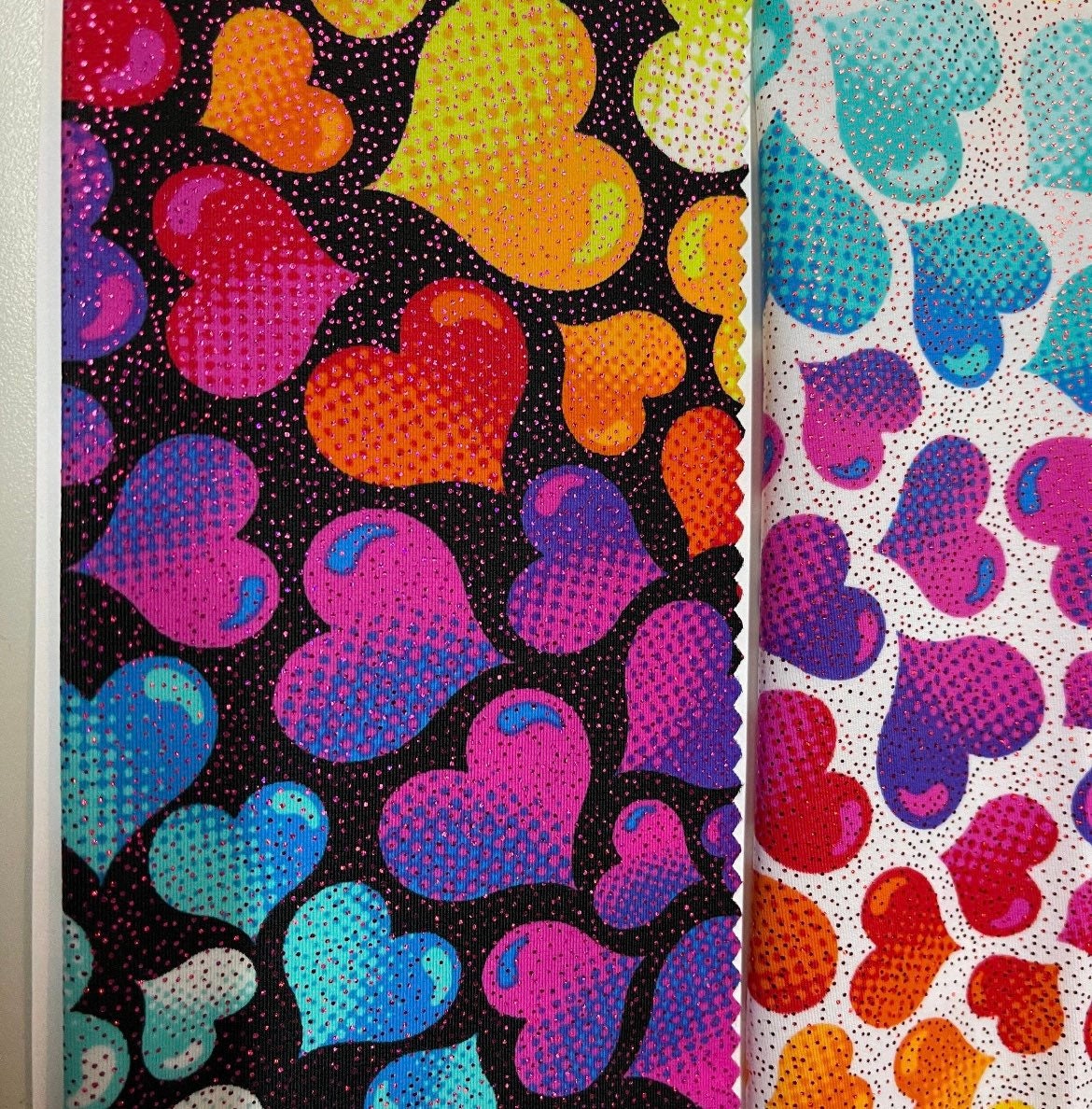 Colorful love heart print on nylon spandex with foil 4-way stretch 58/60”sold by the YD.ships worldwide from Los Angeles California USA.