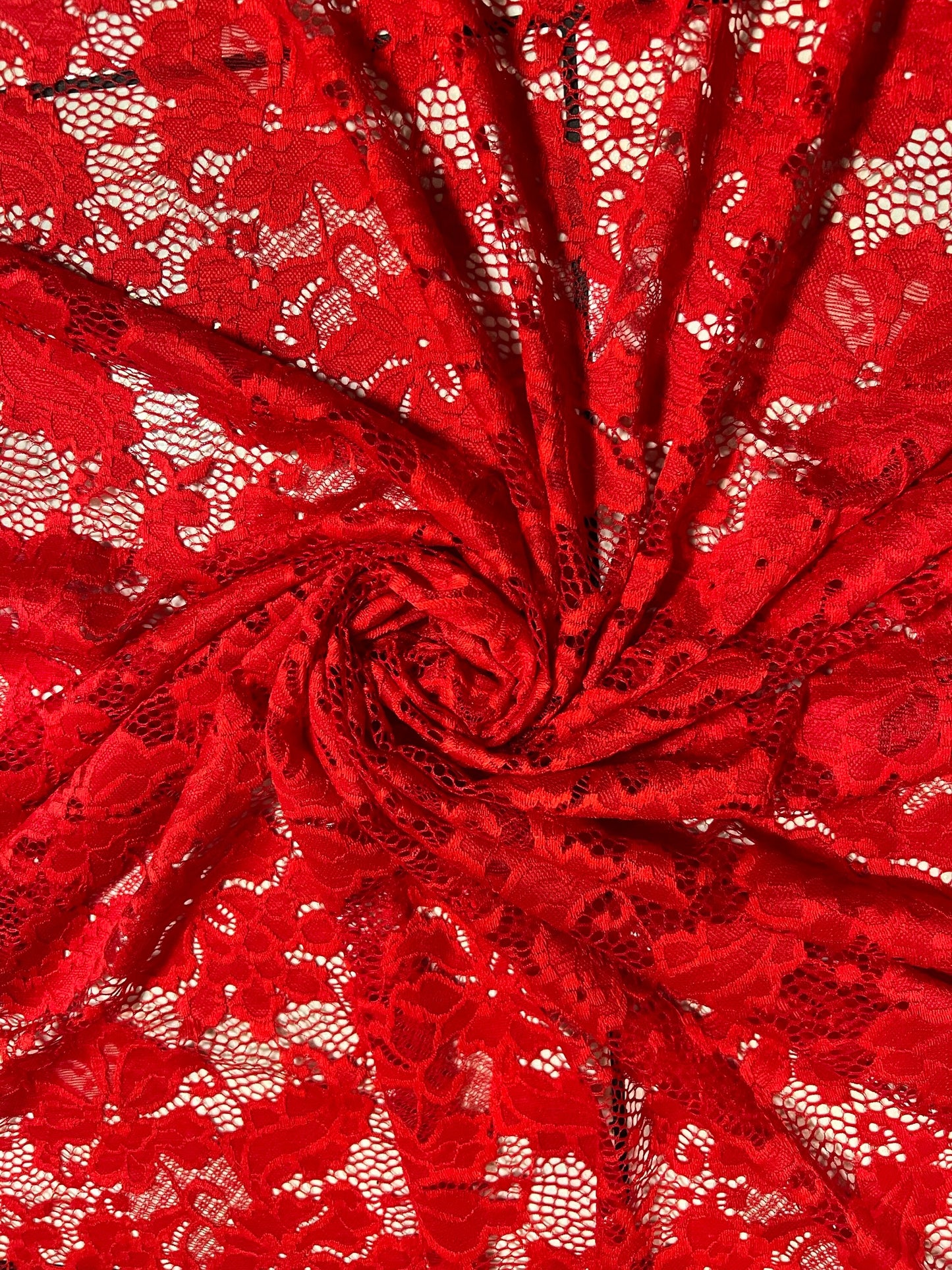 Victoria red lace design 4-way stretch 58/60”sold by the YD.ships worldwide from Los Angeles California USA.