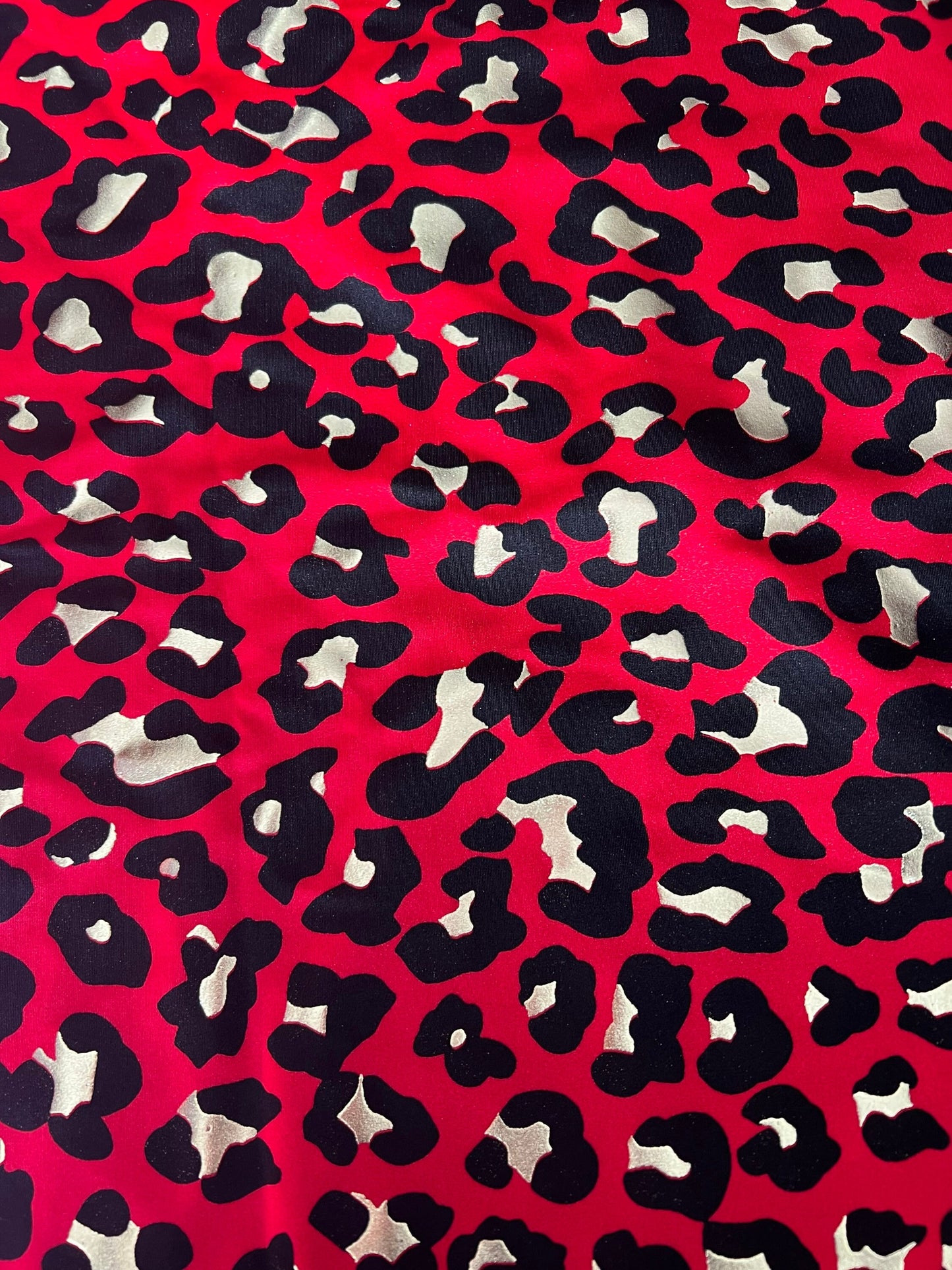 New leopard design with metallic print on the best quality nylon spandex 58/60”sold by the YD.ships worldwide from Los Angeles CA USA.