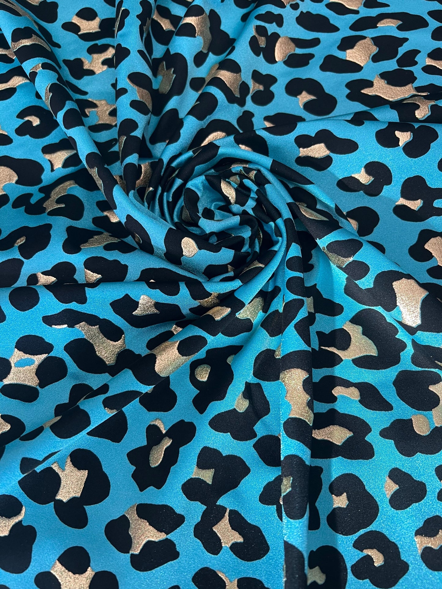 New leopard design with metallic print on the best quality nylon spandex 58/60”sold by the YD.ships worldwide from Los Angeles CA USA.