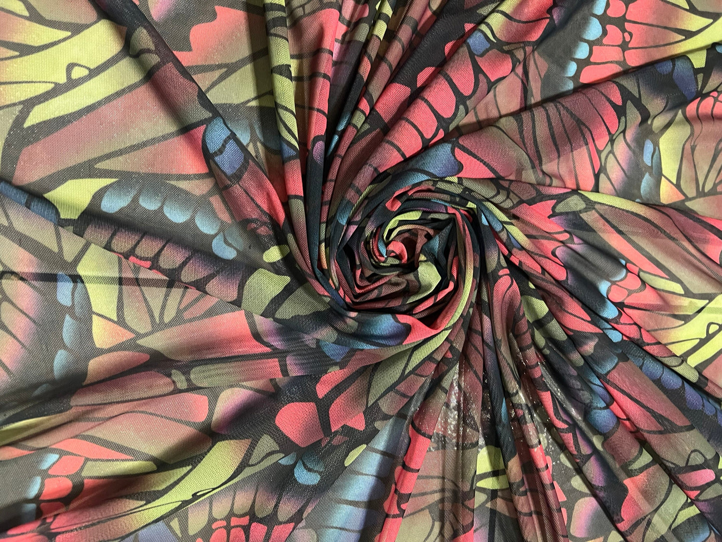 Butterfly wings design print on power mesh nylon spandex 58/60”sold by the YD.Ships worldwide from Los Angeles California USA