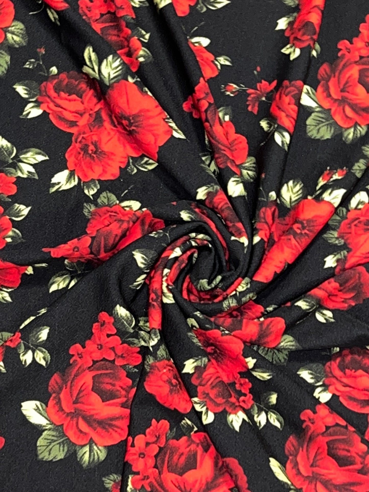 Red roses garden design print on poly spandex 4-stretch 58/60”sold by the YD. Ships worldwide from Los Angeles California USA.