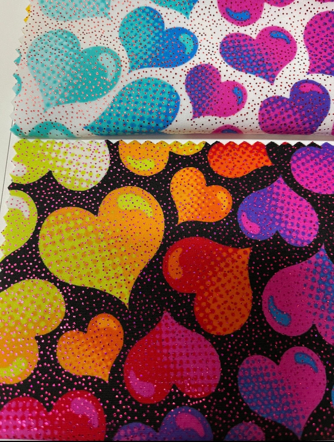 Colorful love heart print on nylon spandex with foil 4-way stretch 58/60”sold by the YD.ships worldwide from Los Angeles California USA.