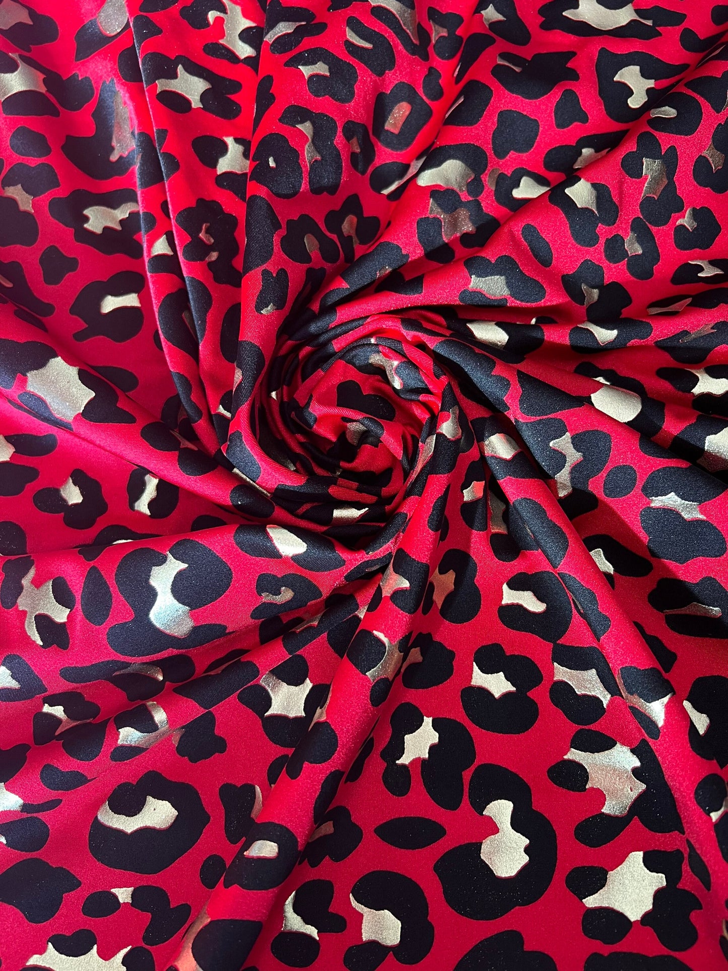 New leopard design with metallic print on the best quality nylon spandex 58/60”sold by the YD.ships worldwide from Los Angeles CA USA.