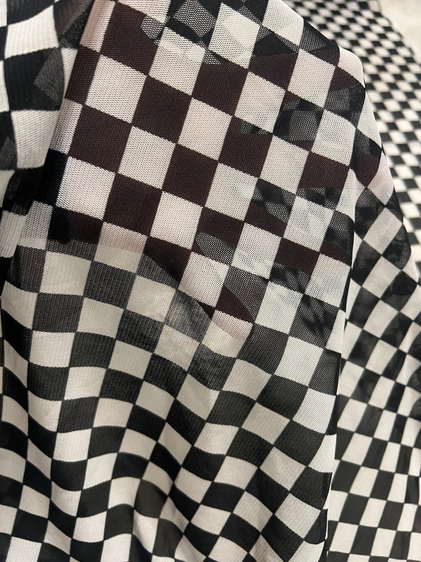 Black white squares checkered print on the best quality of power mesh 2-way stretch 58/60”sold by the YD.Ships worldwide from Los Angeles CA