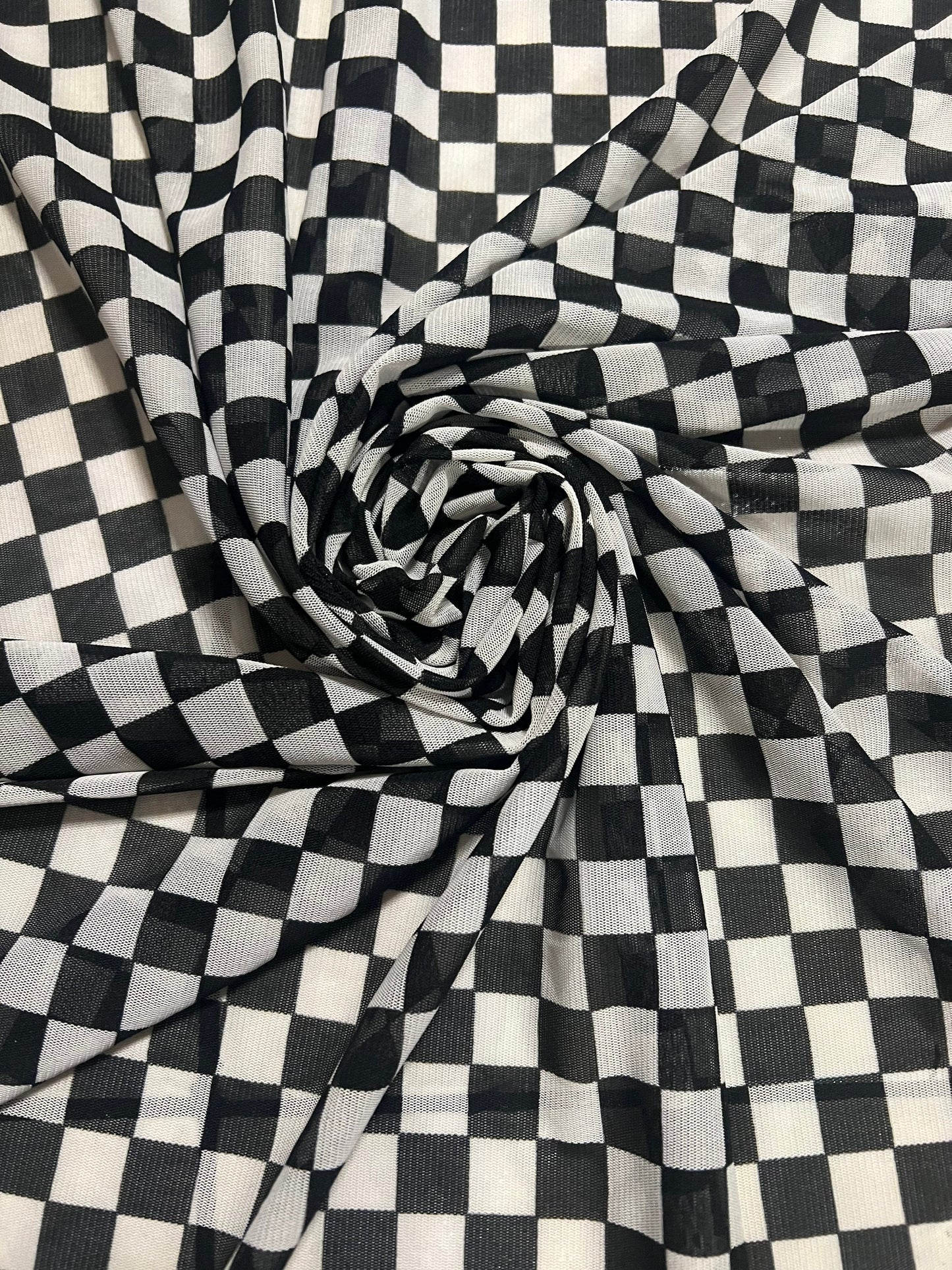 Black white squares checkered print on the best quality of power mesh 2-way stretch 58/60”sold by the YD.Ships worldwide from Los Angeles CA