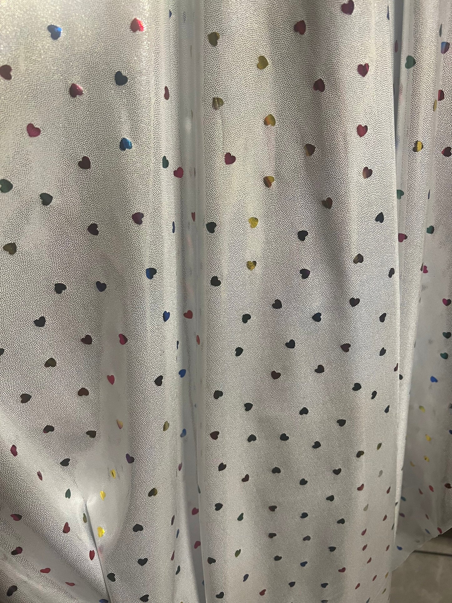 New little hearts hologram design new metallic hologram nylon spandex 4-way stretch 58/60”sold by the YD.Ships worldwide from Los Angeles CA