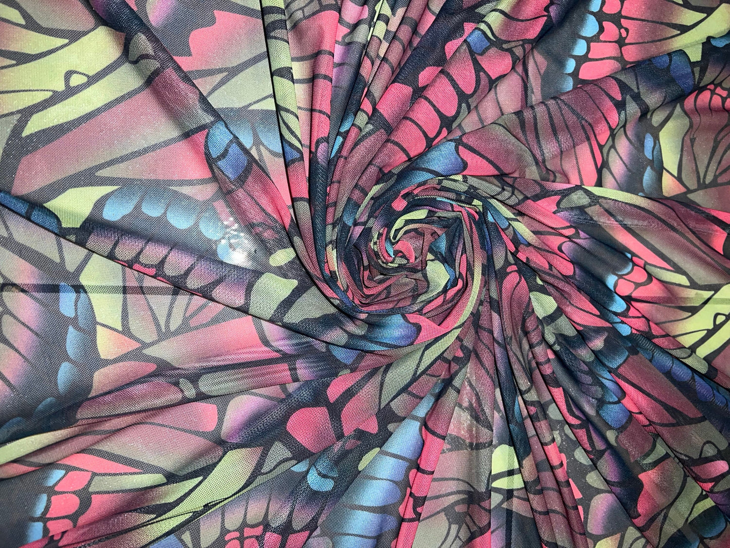 Butterfly wings design print on power mesh nylon spandex 58/60”sold by the YD.Ships worldwide from Los Angeles California USA