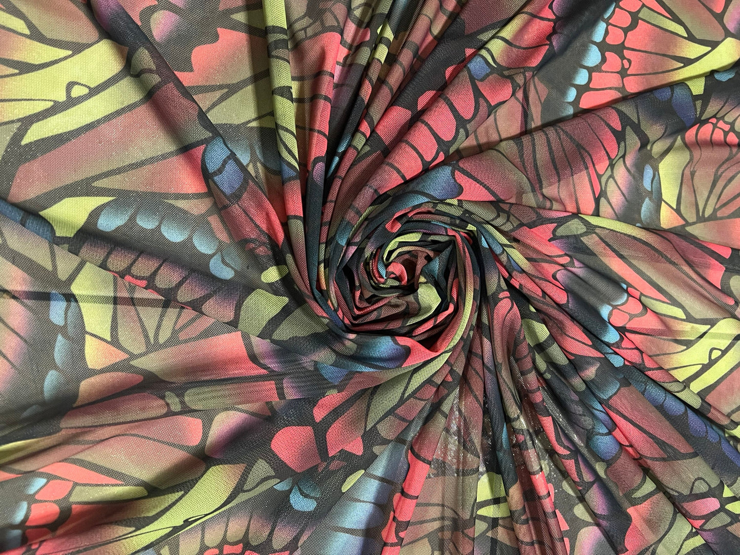 Butterfly wings design print on power mesh nylon spandex 58/60”sold by the YD.Ships worldwide from Los Angeles California USA