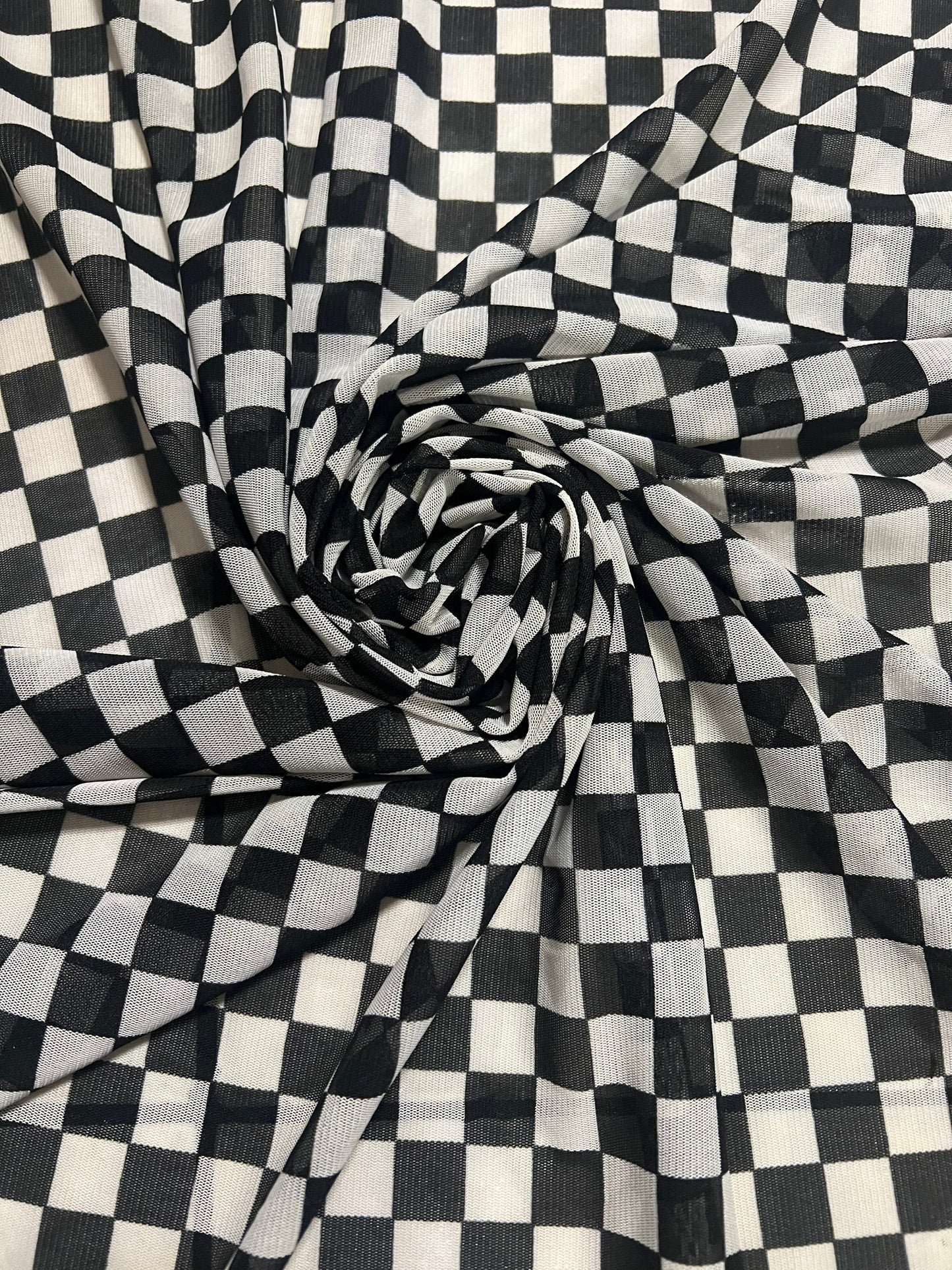 Black white squares checkered print on the best quality of power mesh 2-way stretch 58/60”sold by the YD.Ships worldwide from Los Angeles CA