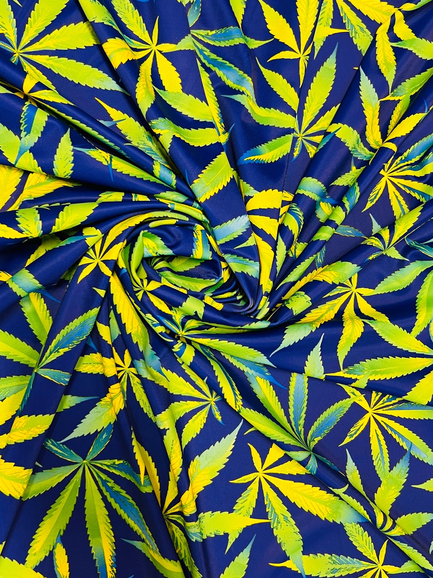 Cannabis Leaf pattern design print on nylon spandex 4-way stretch 58/60”sold by the YD.Ships worldwide from Los Angeles California USA.