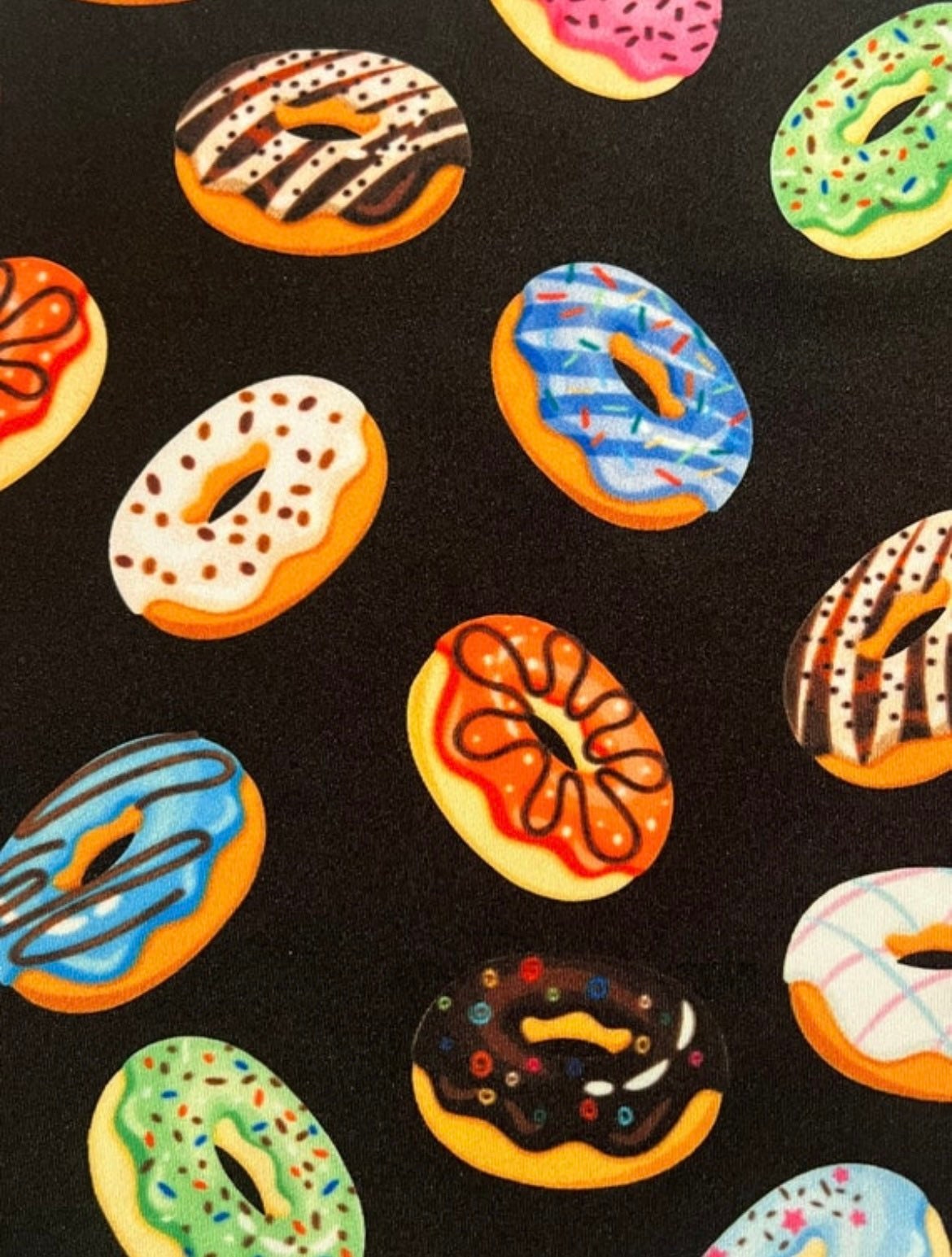 Colorful sweet donuts design print on the best quality nylon spandex 4-way stretch 58/60 sold by the YD. ships Worldwide from Los Ángeles CA