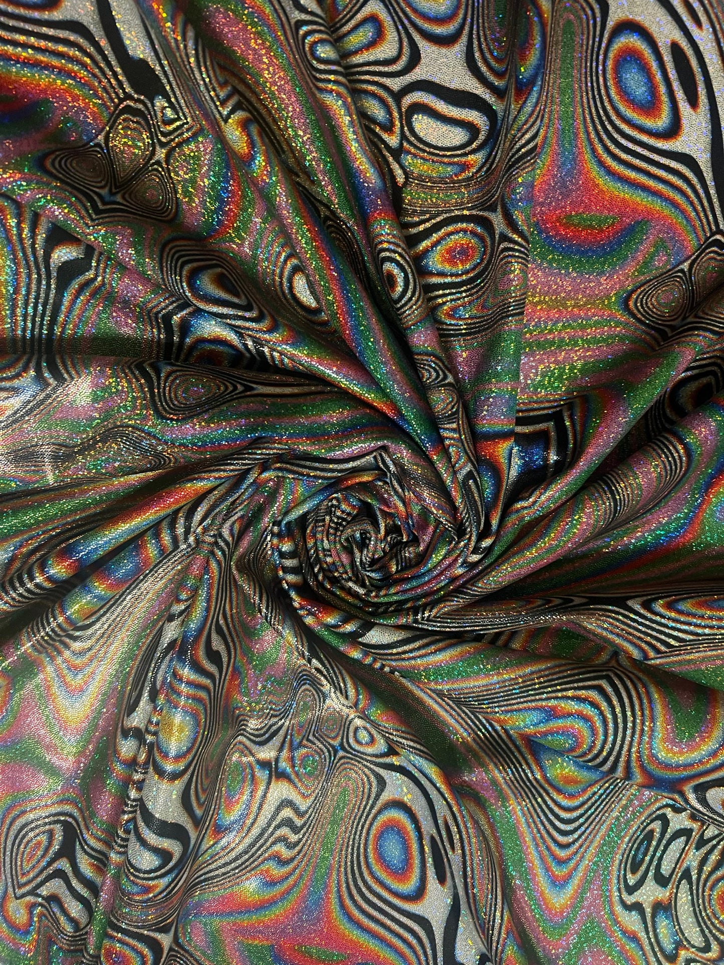 New Hologram lava design metallic on the best quality of nylon spandex 4-stretch 58/60”Sold by the YD.Ships worldwide from Los Angeles CA.