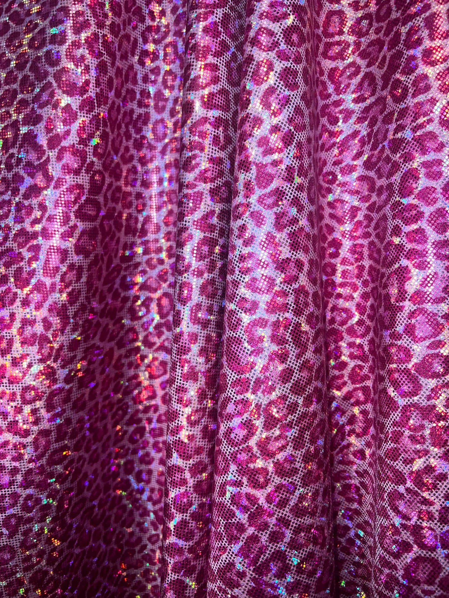 New Leopard pattern design on shattered glass hologram metallic nylon spandex 4-way stretch 58/60”Sold by the YD.Ships worldwide from LA.