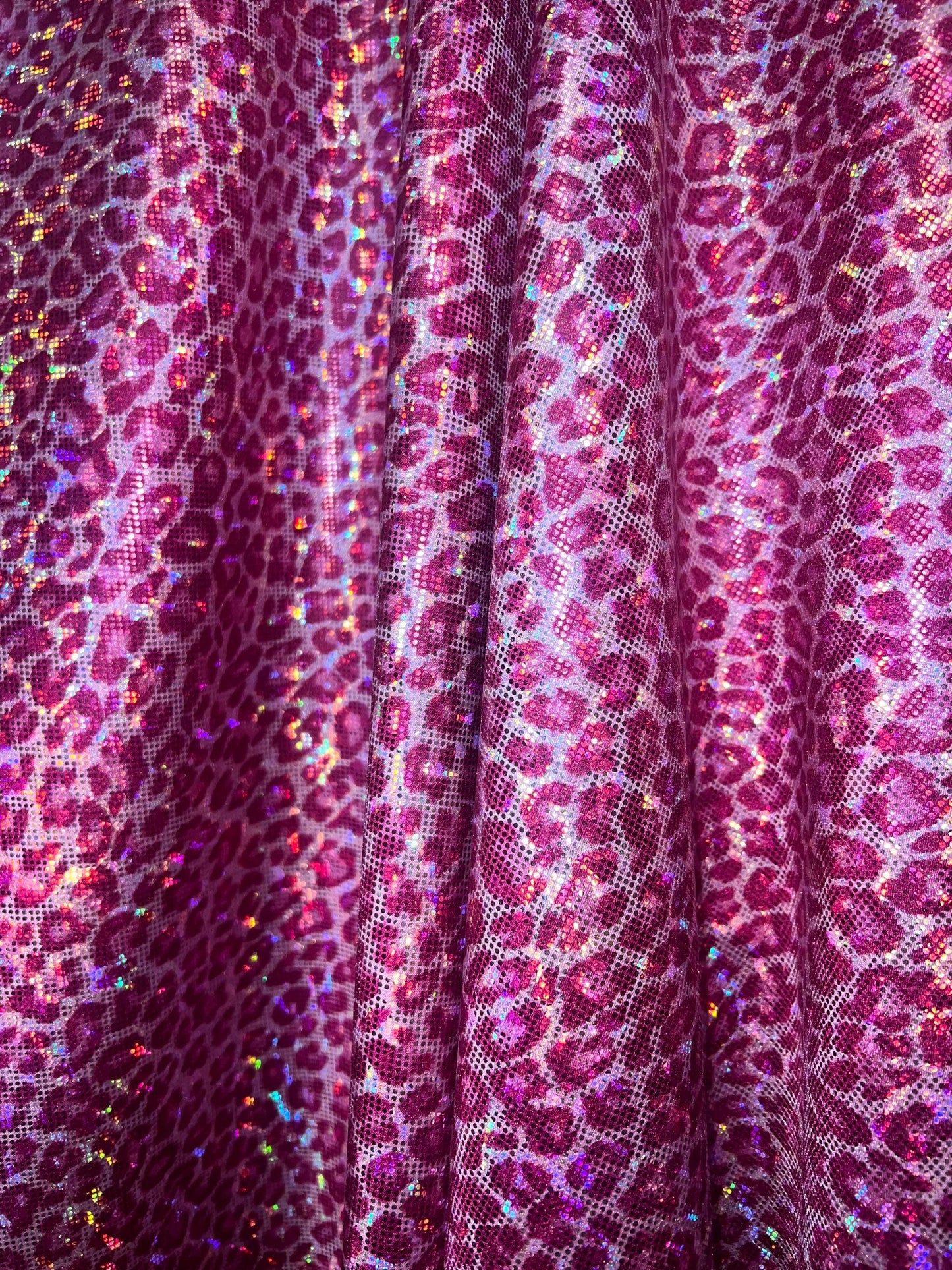 New Leopard pattern design on shattered glass hologram metallic nylon spandex 4-way stretch 58/60”Sold by the YD.Ships worldwide from LA.