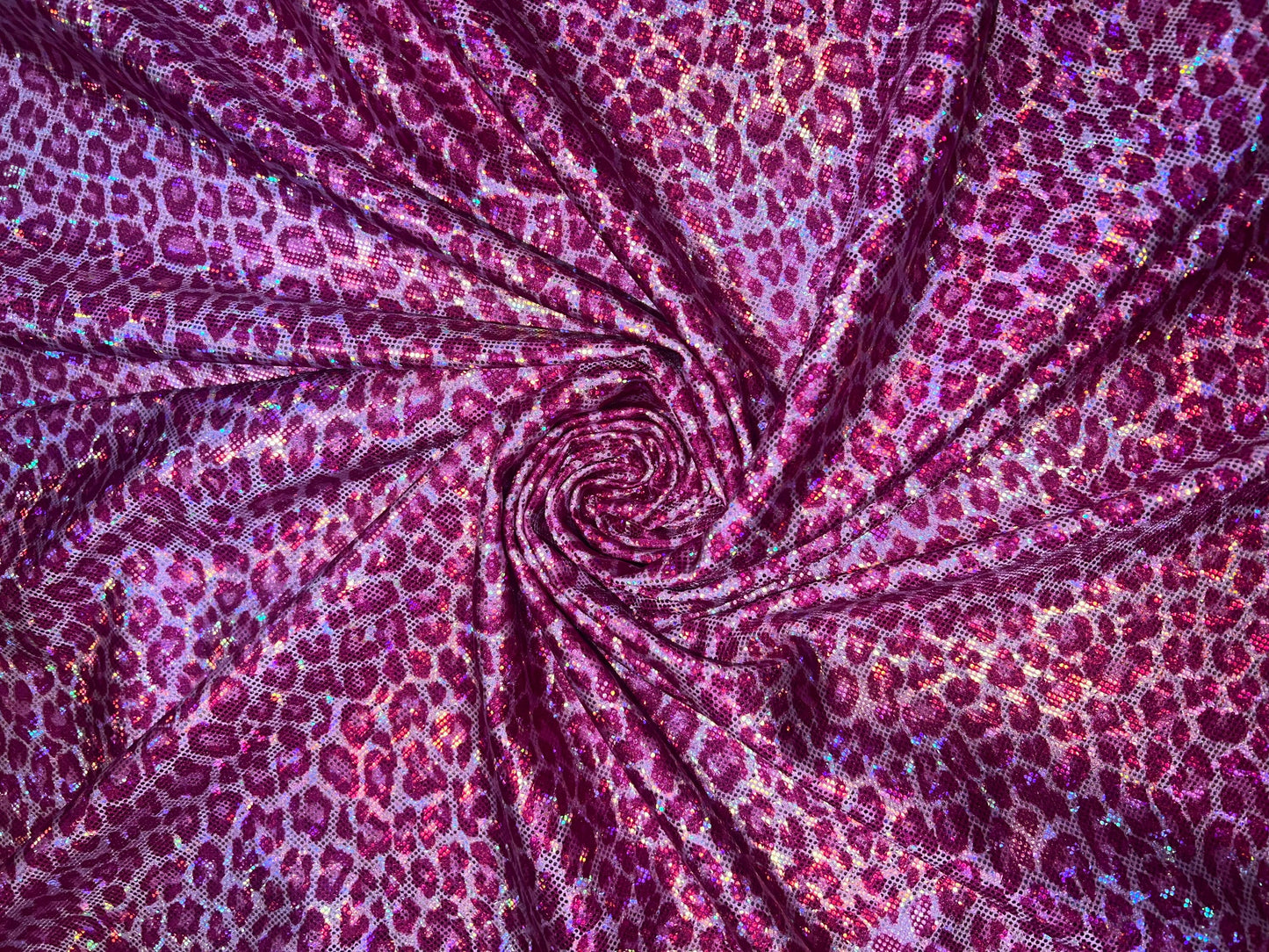 New Leopard pattern design on shattered glass hologram metallic nylon spandex 4-way stretch 58/60”Sold by the YD.Ships worldwide from LA.