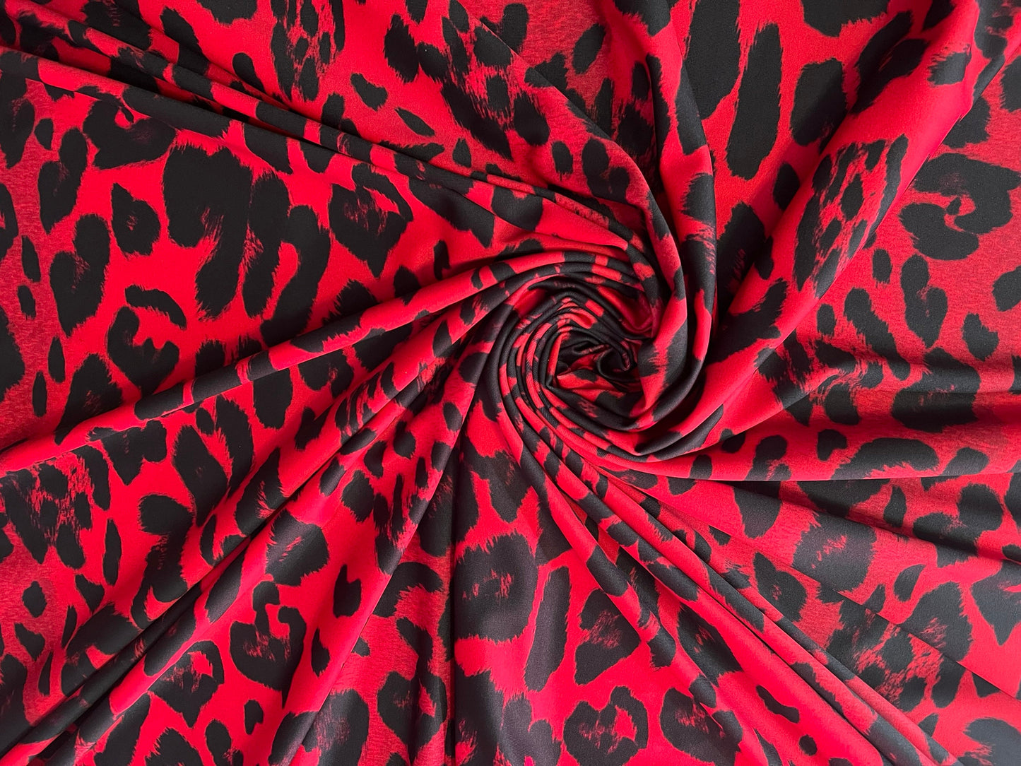 New Red and Black Leopard design print on the best quality of nylon spandex 4-stretch 58/60”Sold by the YD.Ships worldwide from Los Angeles