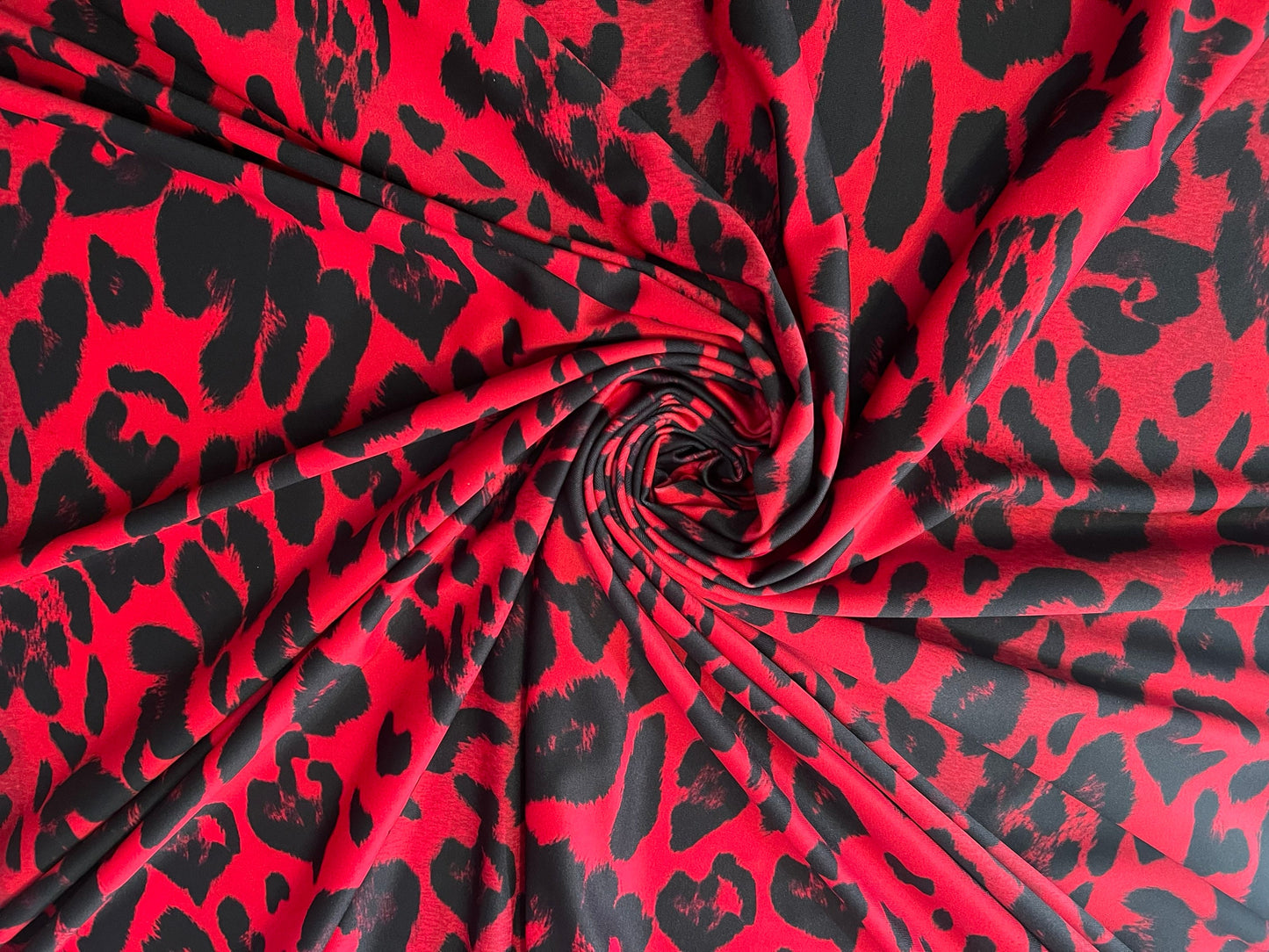 New Red and Black Leopard design print on the best quality of nylon spandex 4-stretch 58/60”Sold by the YD.Ships worldwide from Los Angeles