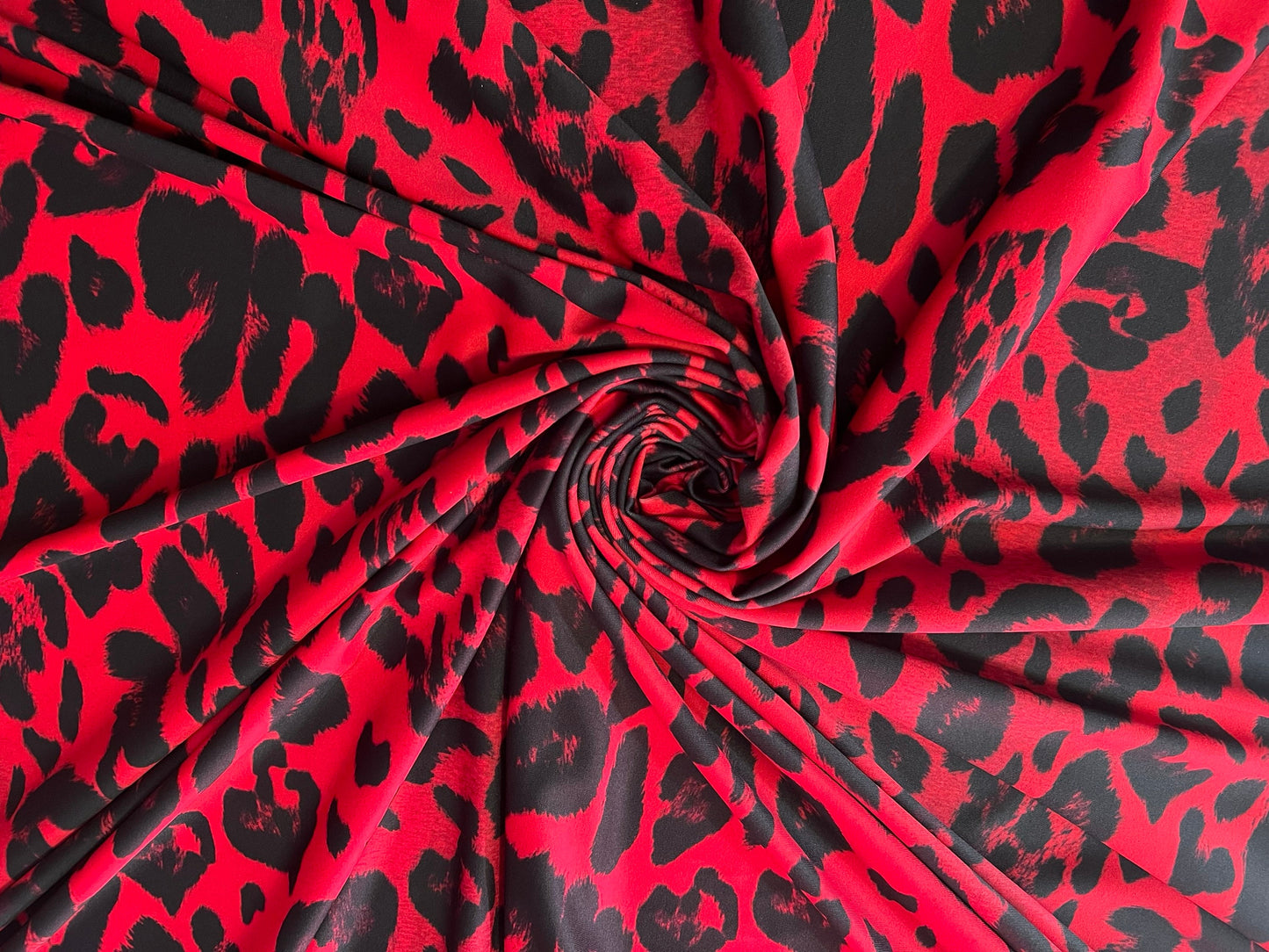 New Red and Black Leopard design print on the best quality of nylon spandex 4-stretch 58/60”Sold by the YD.Ships worldwide from Los Angeles