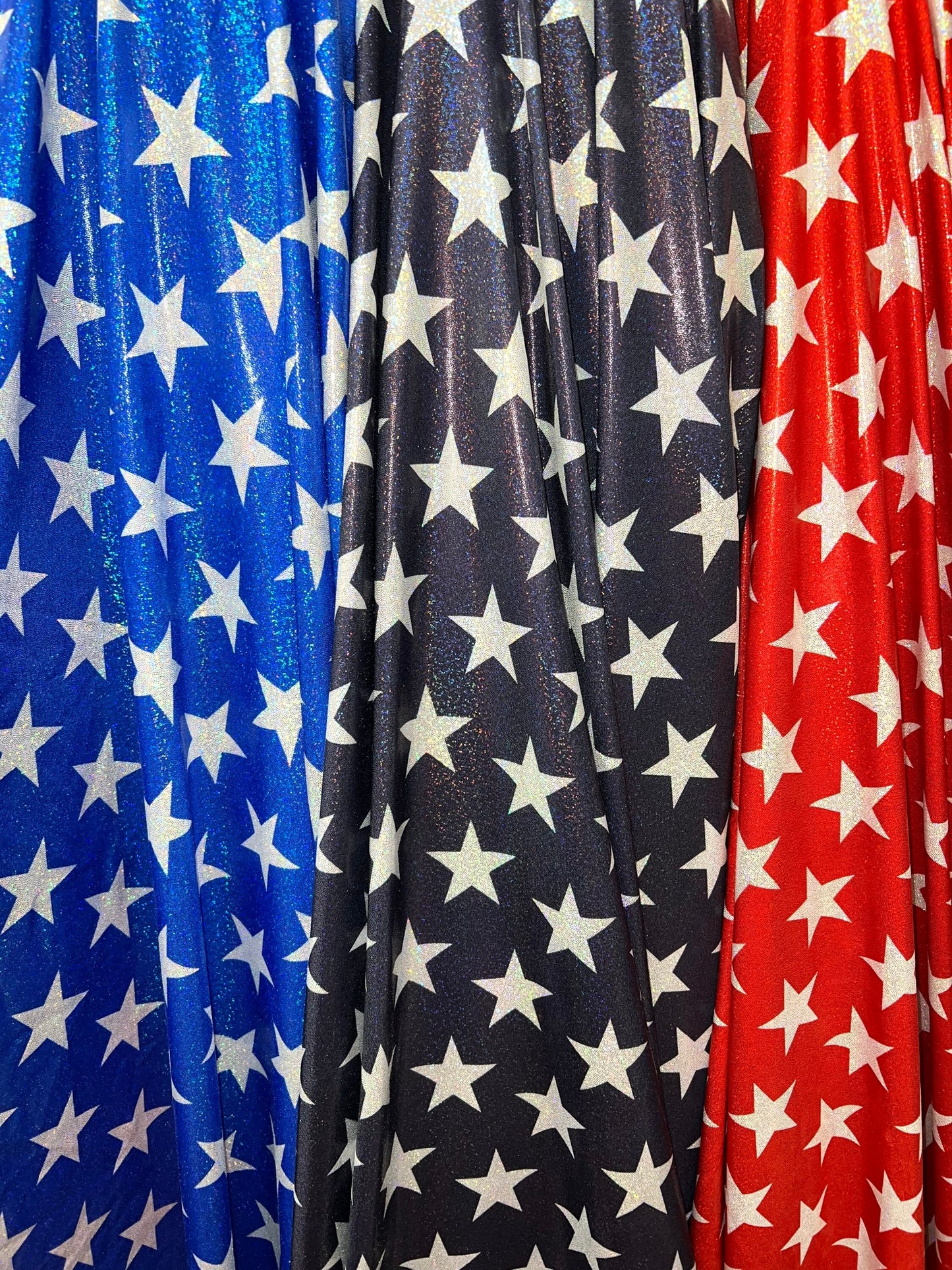 New Hologram Metallic stars design print on nylon spandex 4-way stretch 58/60”Sold by the YD.Ships worldwide from Los Angeles California USA