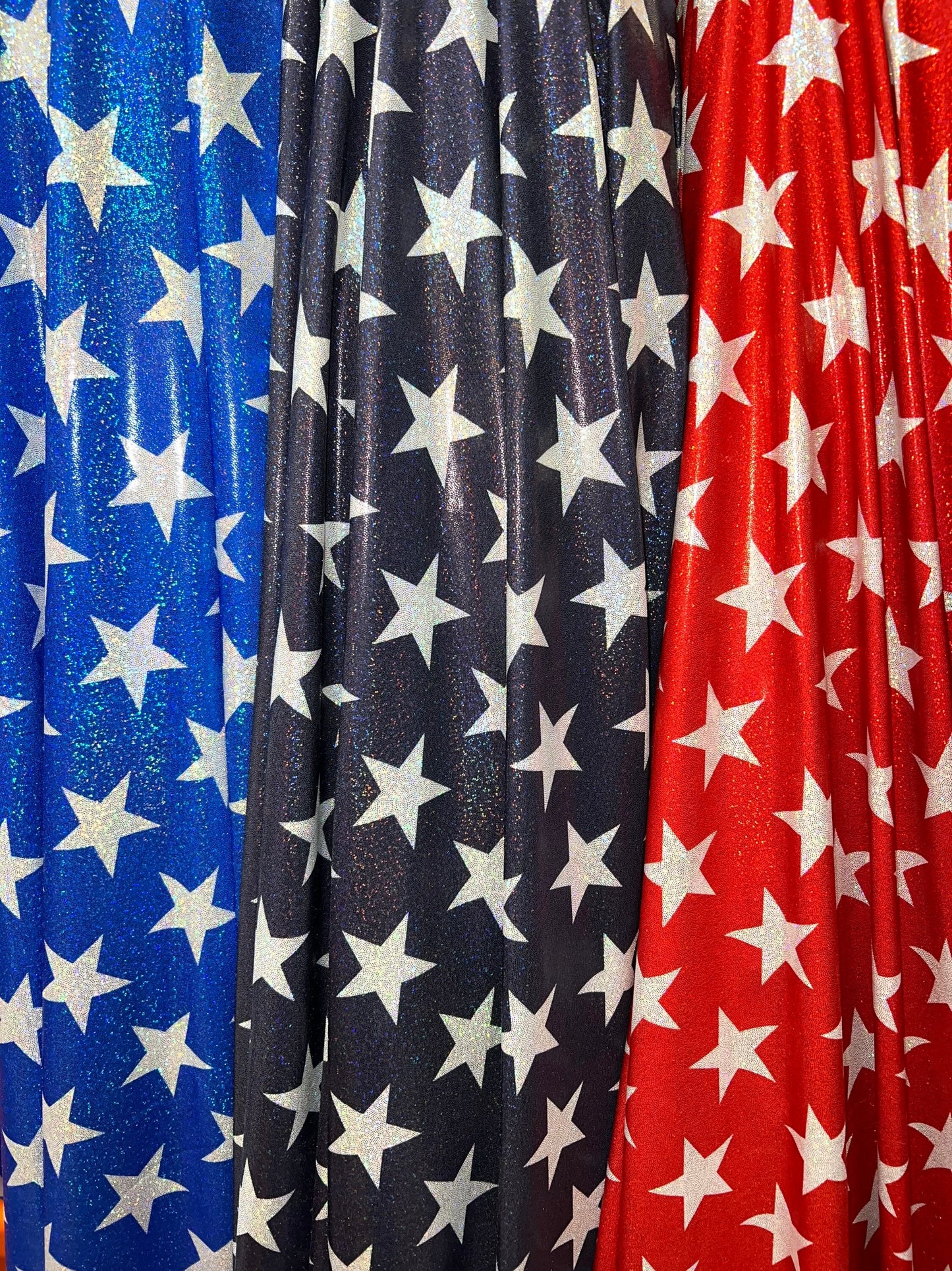 New Hologram Metallic stars design print on nylon spandex 4-way stretch 58/60”Sold by the YD.Ships worldwide from Los Angeles California USA