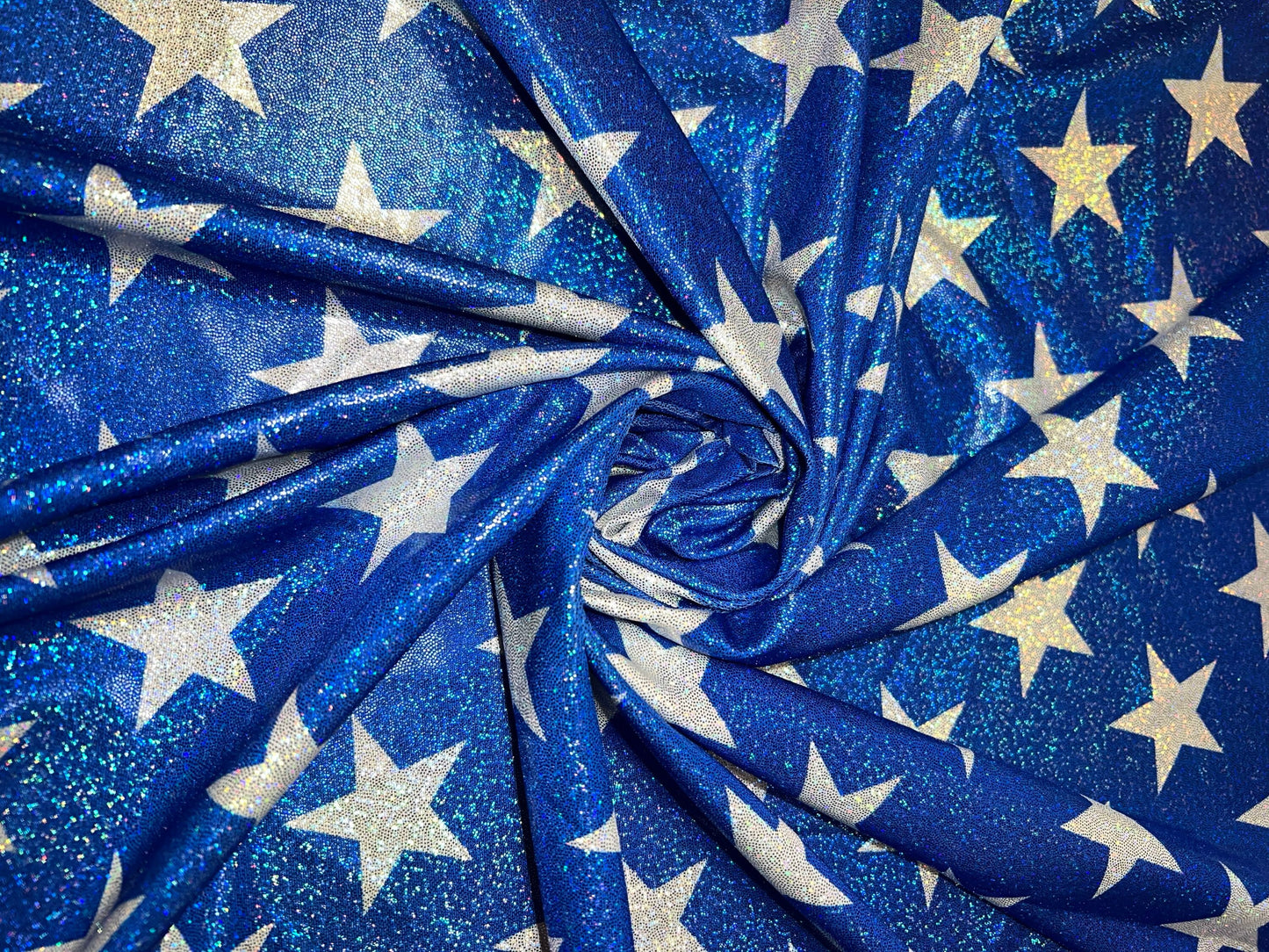 New Hologram Metallic stars design print on nylon spandex 4-way stretch 58/60”Sold by the YD.Ships worldwide from Los Angeles California USA