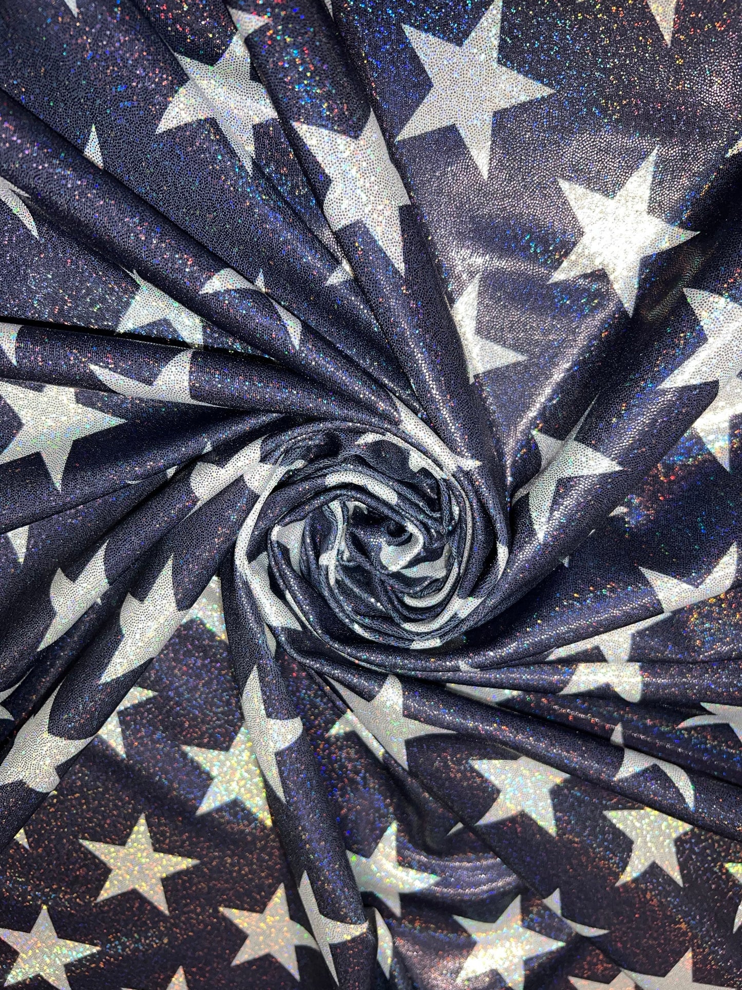 New Hologram Metallic stars design print on nylon spandex 4-way stretch 58/60”Sold by the YD.Ships worldwide from Los Angeles California USA