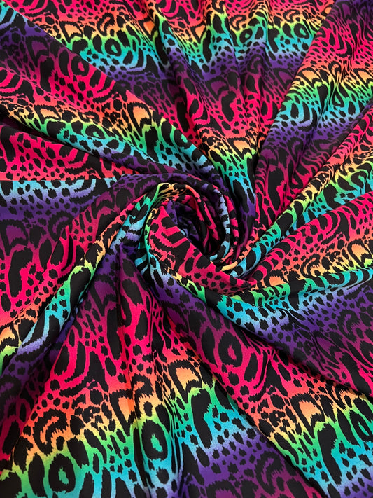 New Rainbow Leopard design print on the best quality of nylon spandex 4-way Stretch 58/60” Sold by the YD.Ships worldwide from Los Angeles