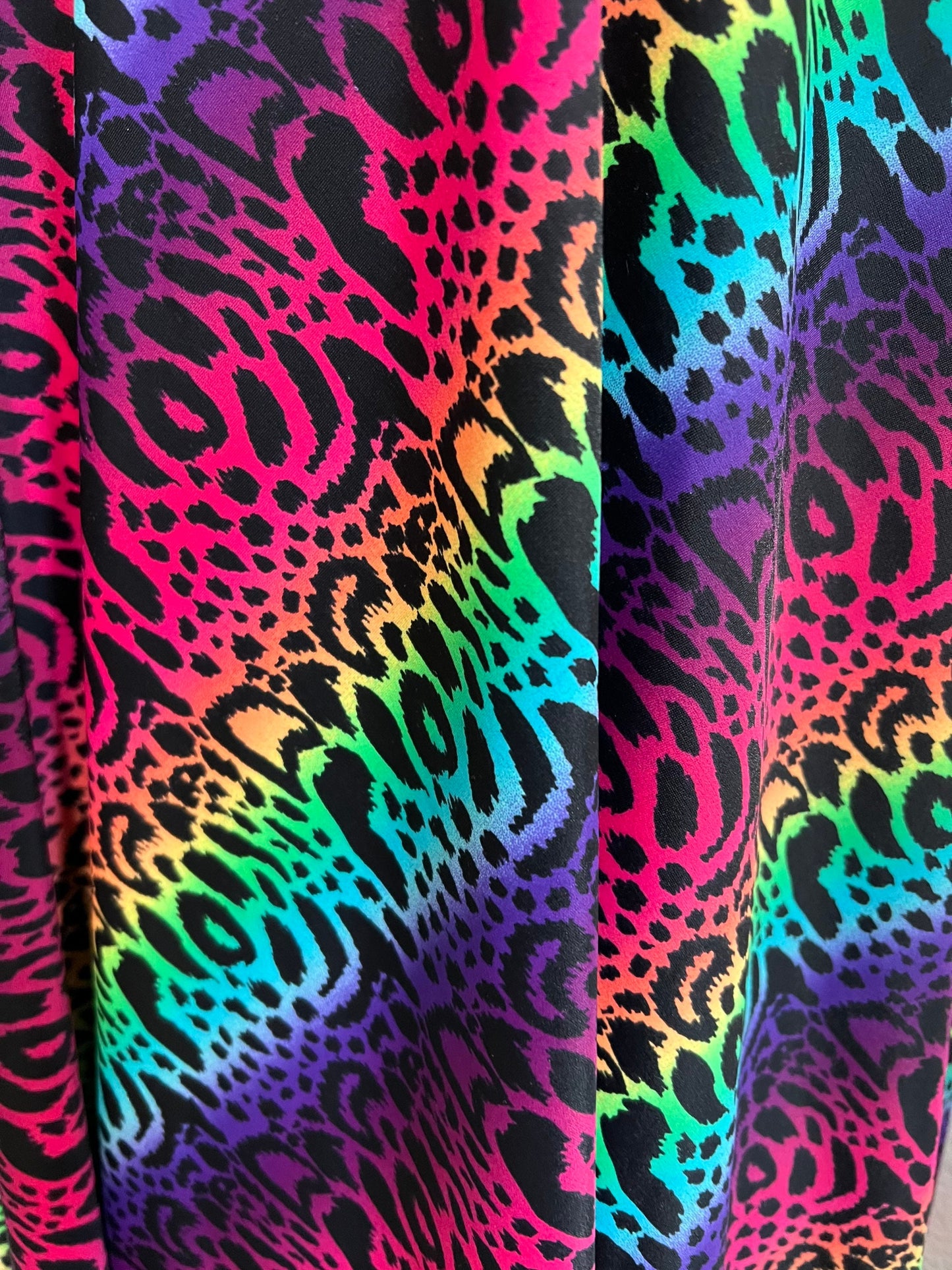 New Rainbow Leopard design print on the best quality of nylon spandex 4-way Stretch 58/60” Sold by the YD.Ships worldwide from Los Angeles