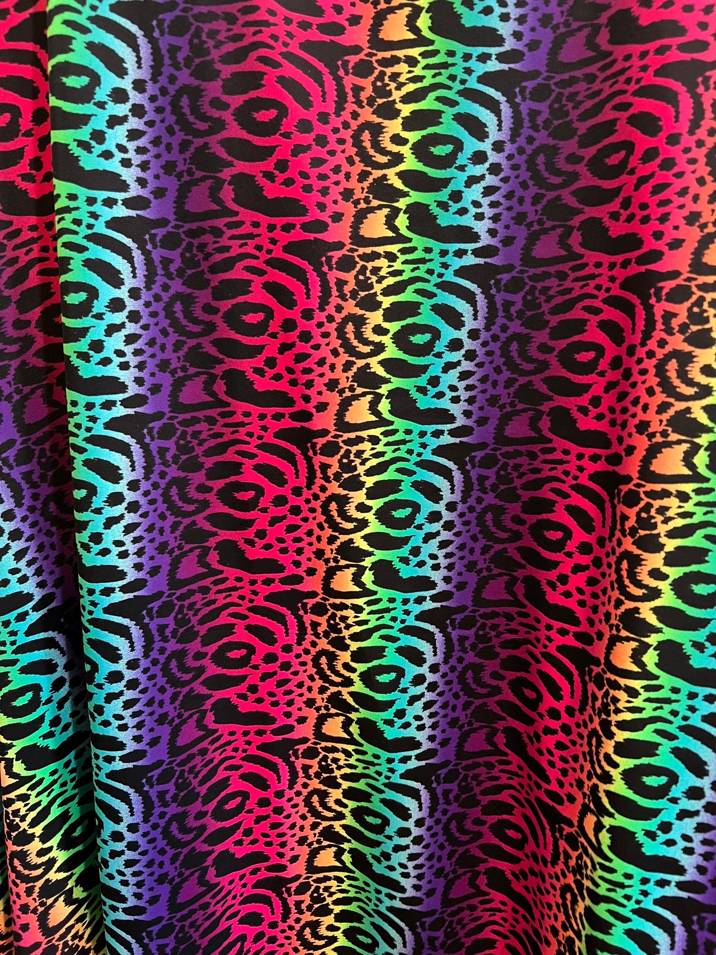 New Rainbow Leopard design print on the best quality of nylon spandex 4-way Stretch 58/60” Sold by the YD.Ships worldwide from Los Angeles