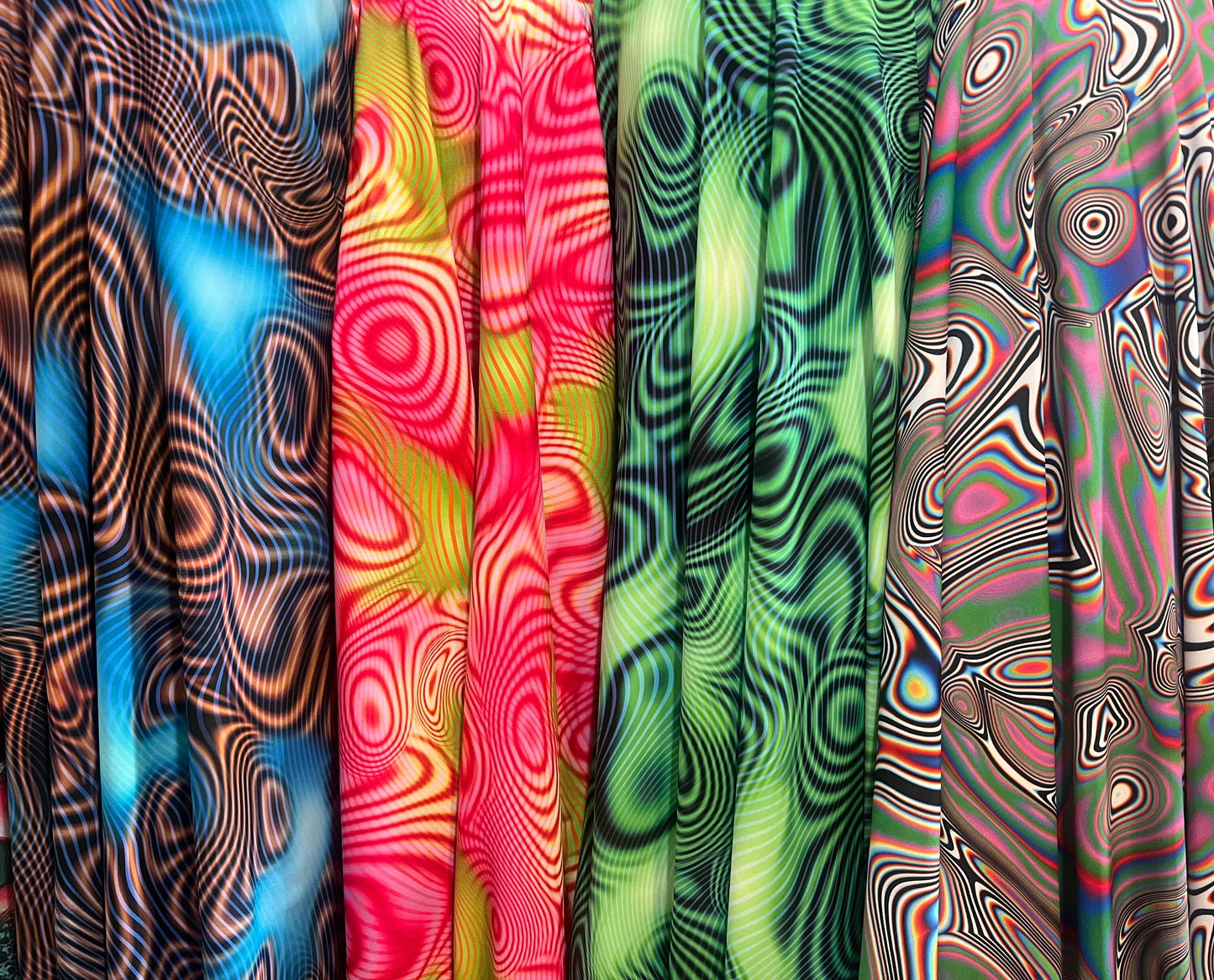 New swirl pattern design print on the best quality of nylon spandex 4-way stretch 58/60”Sold by the YD.Ships worldwide from Los Angeles CA.