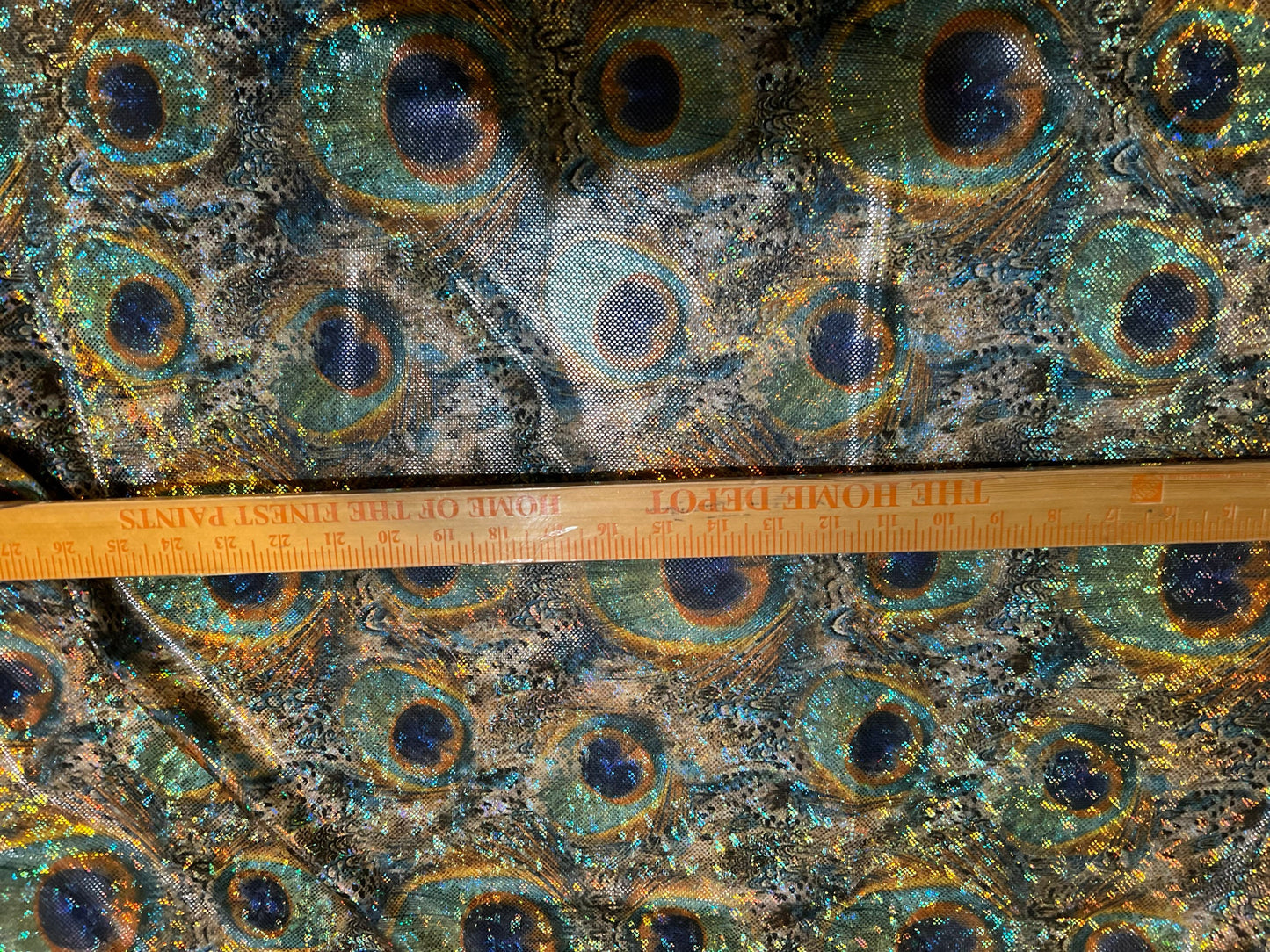 New Hologram metallic peacock  design print on the best quality of nylon spandex4way Stretch 58/60” Sold by the YD.Ships worldwide from LA.