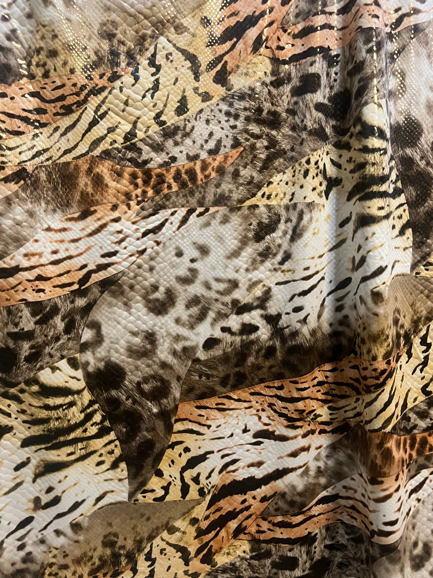 Safari animal design print on poly spandex with clear foil 2-way Stretch 58/60”Sold by the YD.Ships worldwide from Los Angeles California