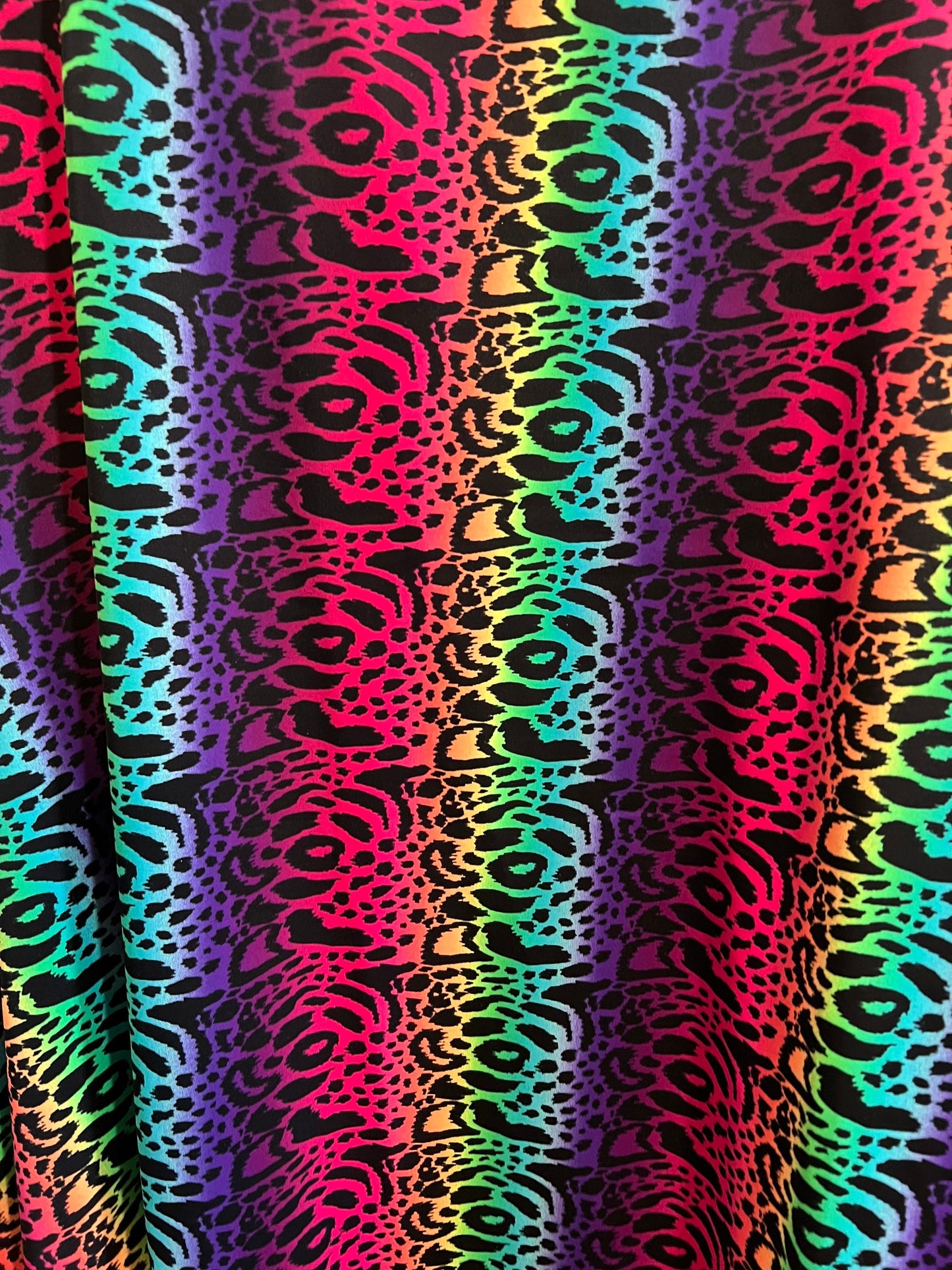 New Rainbow Leopard design print on the best quality of nylon spandex 4-way Stretch 58/60” Sold by the YD.Ships worldwide from Los Angeles