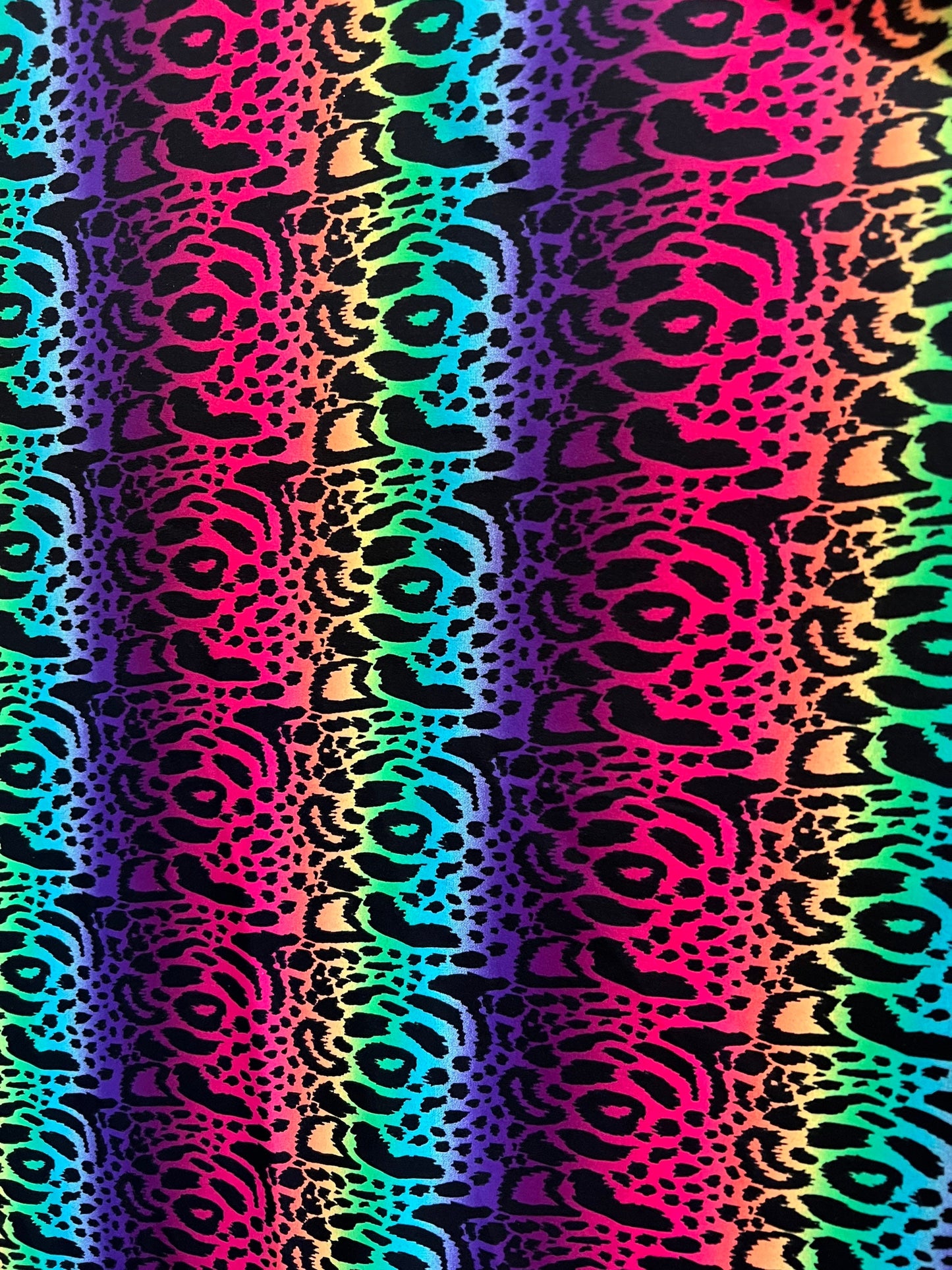 New Rainbow Leopard design print on the best quality of nylon spandex 4-way Stretch 58/60” Sold by the YD.Ships worldwide from Los Angeles