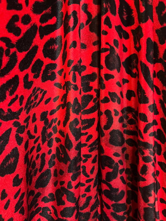 Red/Black Leopard Skin design print on the best quality of stretch velvet 4-way stretch 58/60”sold by the YD.Ships worldwide from LA  USA.