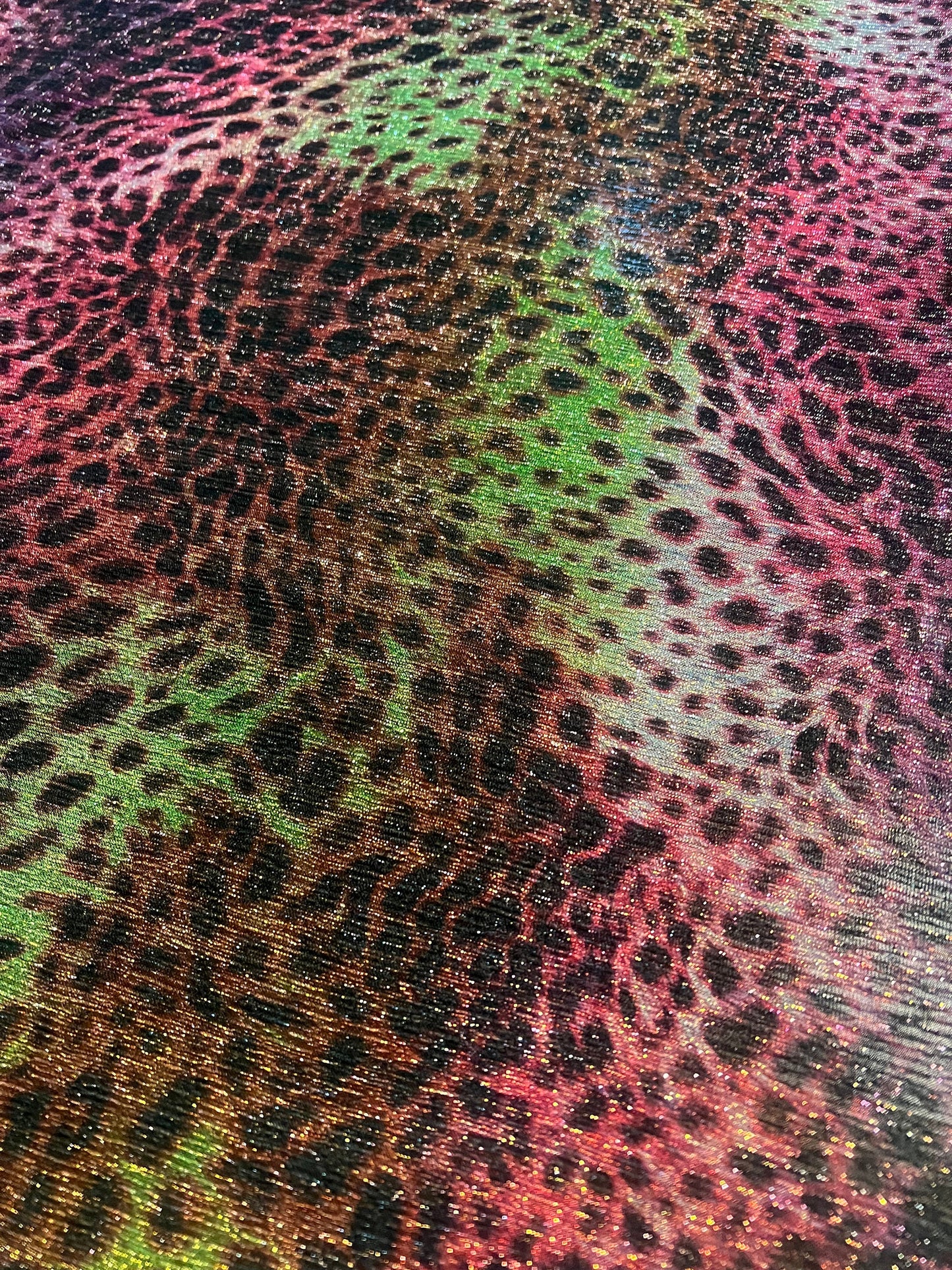 Leopard tie dye design print on pleated metallic mesh 4-way stretch 58/60”Sold by the YD.Ships worldwide from Los Angeles California USA