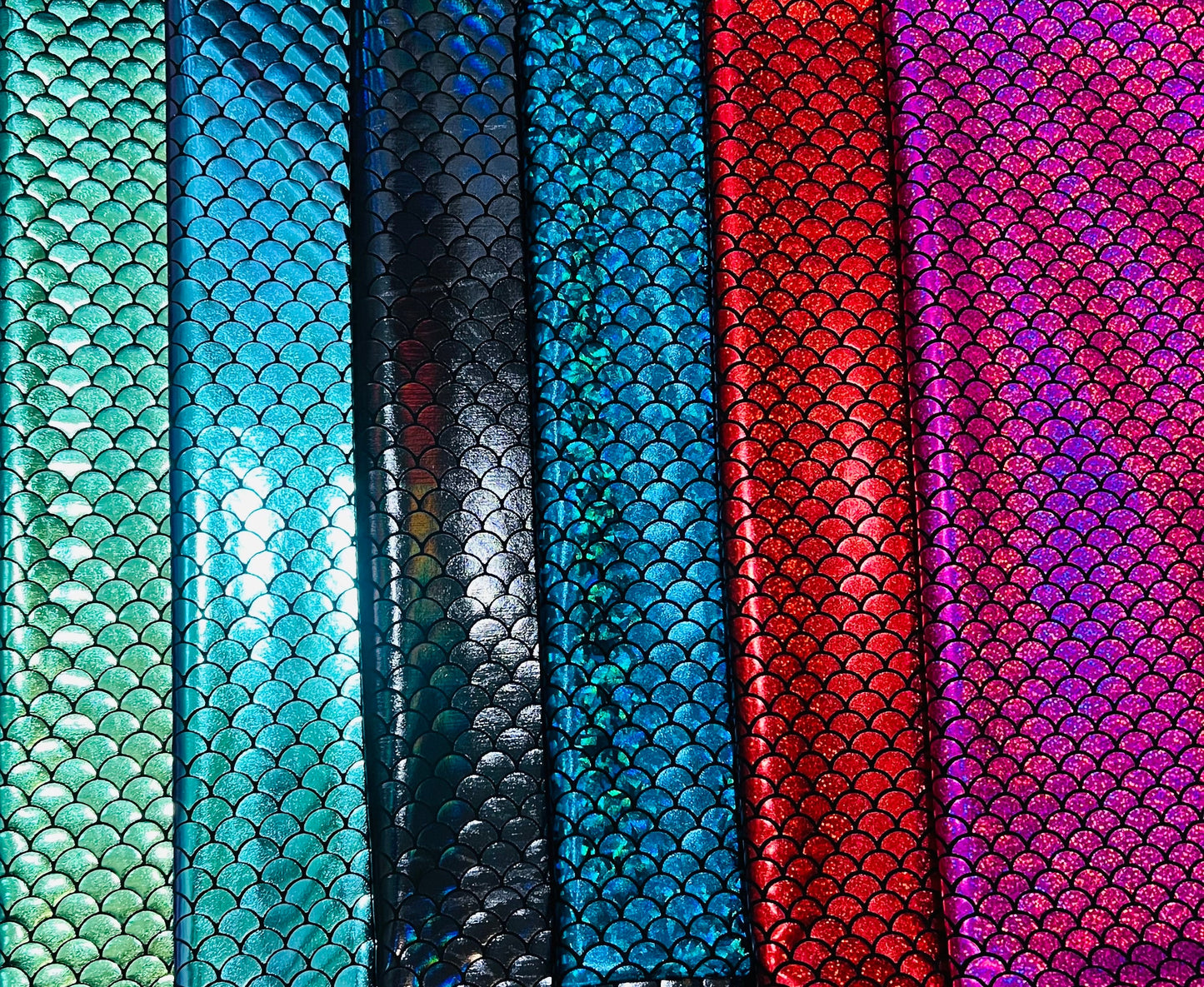 Hologram and iridescent mermaid scales print on nylon spandex 4-way stretch 58/60”Sold by the YD.Ships worldwide from Los Angeles California