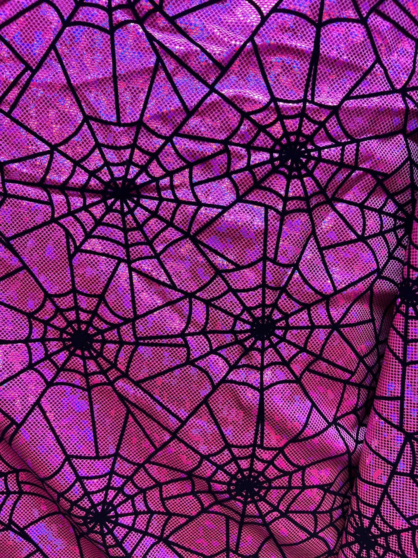 New Spiderwebs design print on hologram metallic nylon spandex with flocking 4-way stretch 58/60”sold by the YD.Ships worldwide from LA USA.