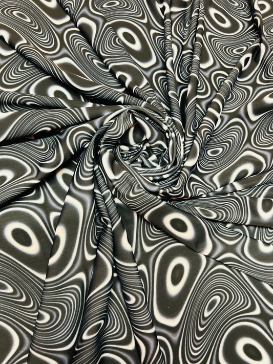 New Blank and White Abstract print on the best quality of nylon spandex 4-way Stretch 58/60”sold by the yard.Ships worldwide from LA CA.