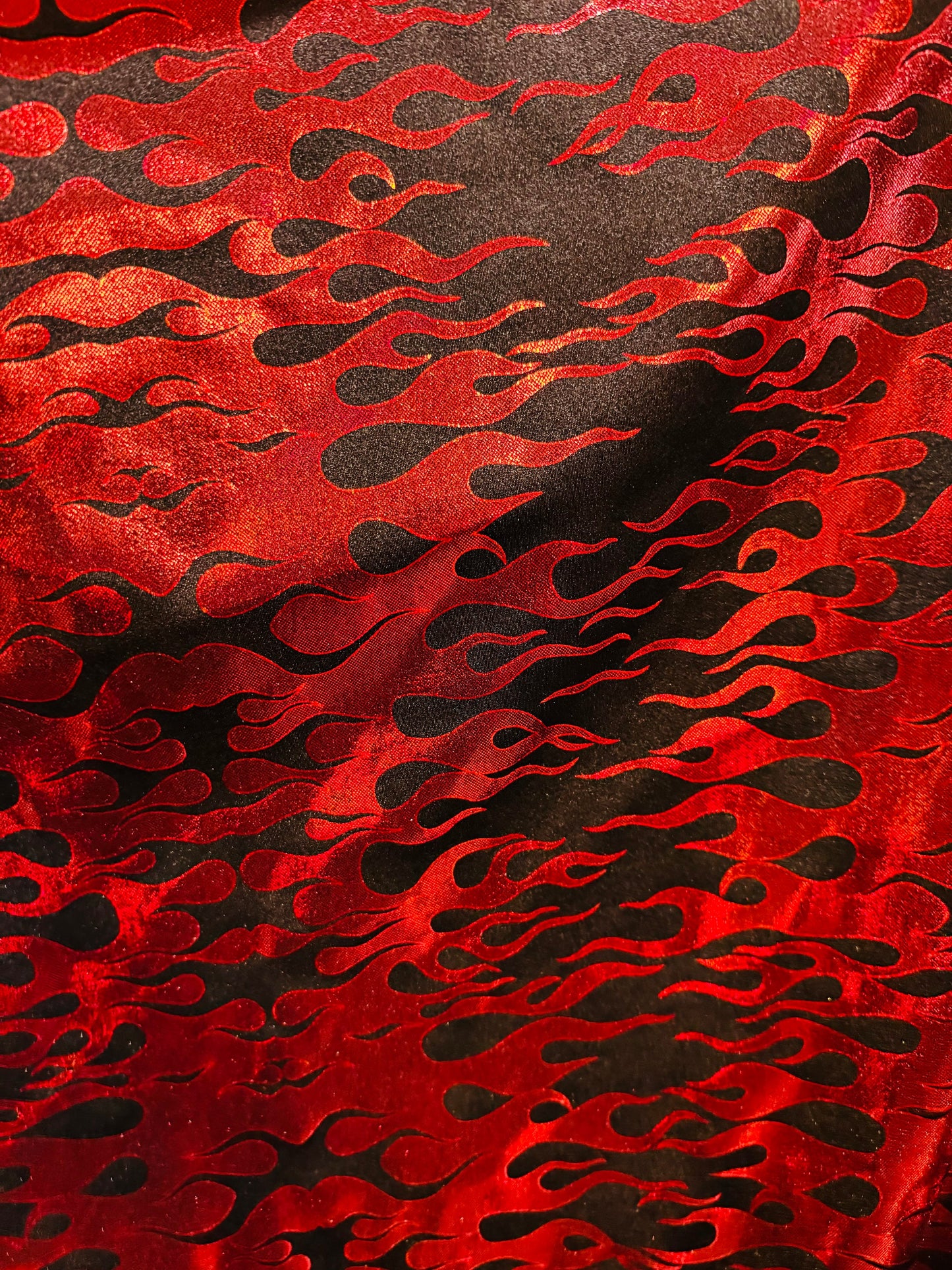 New flames pattern design hologram metallic nylon spandex 4-way stretch 58/60”Sold by the YD. Ships from Los Angeles California USA.