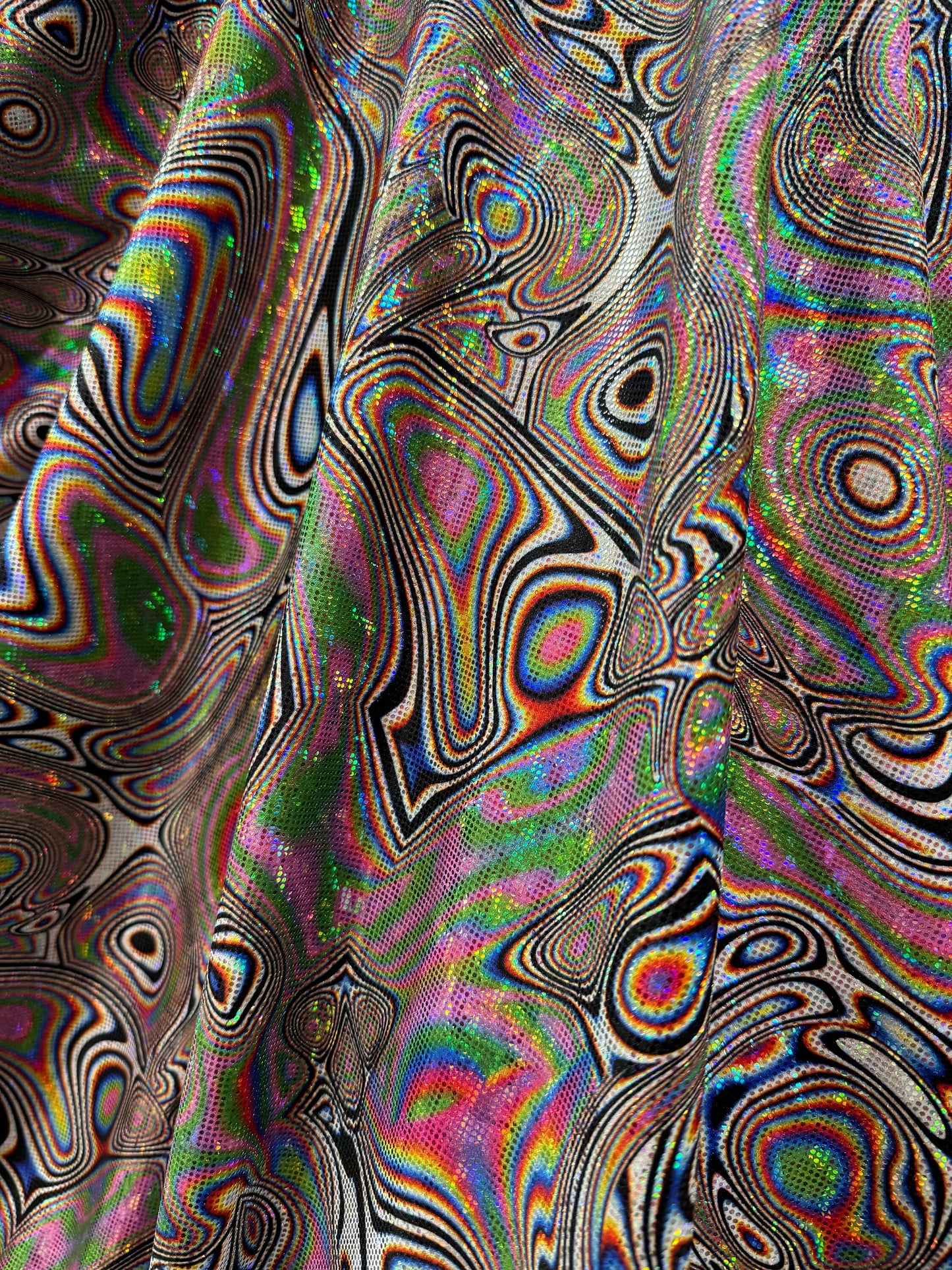 New abstract design on shattered glass hologram nylon spandex 4-way stretch 58/60”Sold by the YD.ships worldwide from Los Angeles