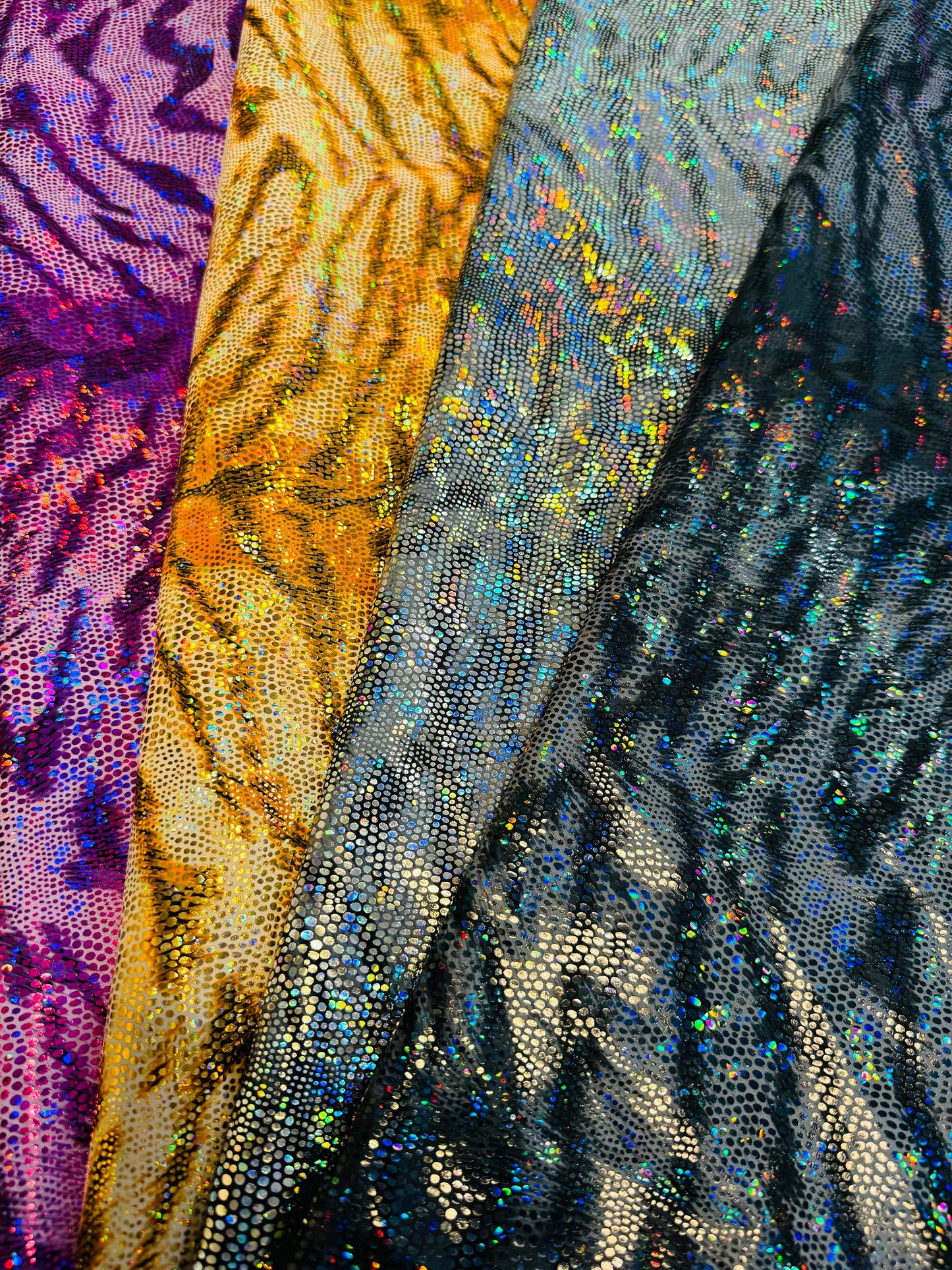 New modern tiger design hologram metallic nylon spandex 4-way stretch 58/60”Sold by the YD.Ships worldwide from Los Angeles California USA.