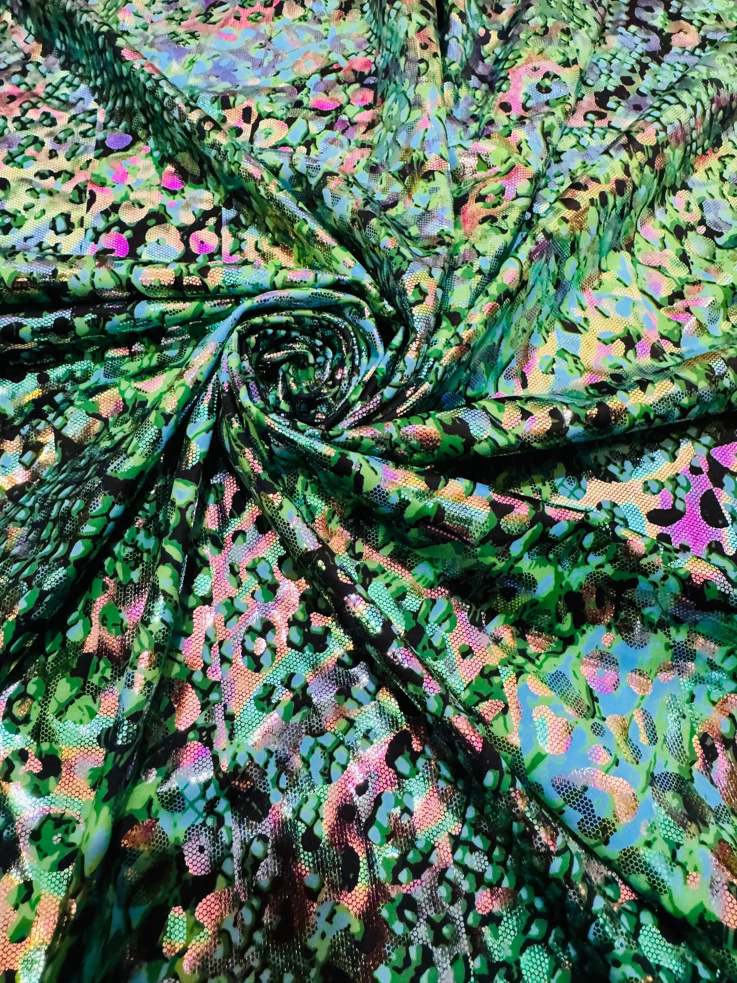 New skin reptile design prints on nylon spandex hologram metallic 4-way stretch 58/60”Sold by the YD.Ships worldwide from Los Angeles CA.