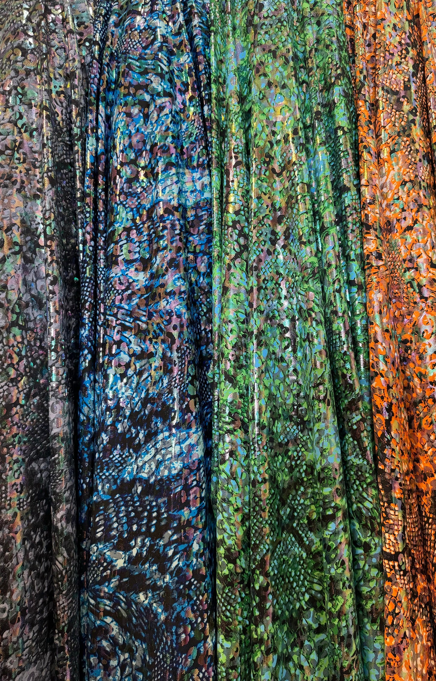 New skin reptile design prints on nylon spandex hologram metallic 4-way stretch 58/60”Sold by the YD.Ships worldwide from Los Angeles CA.