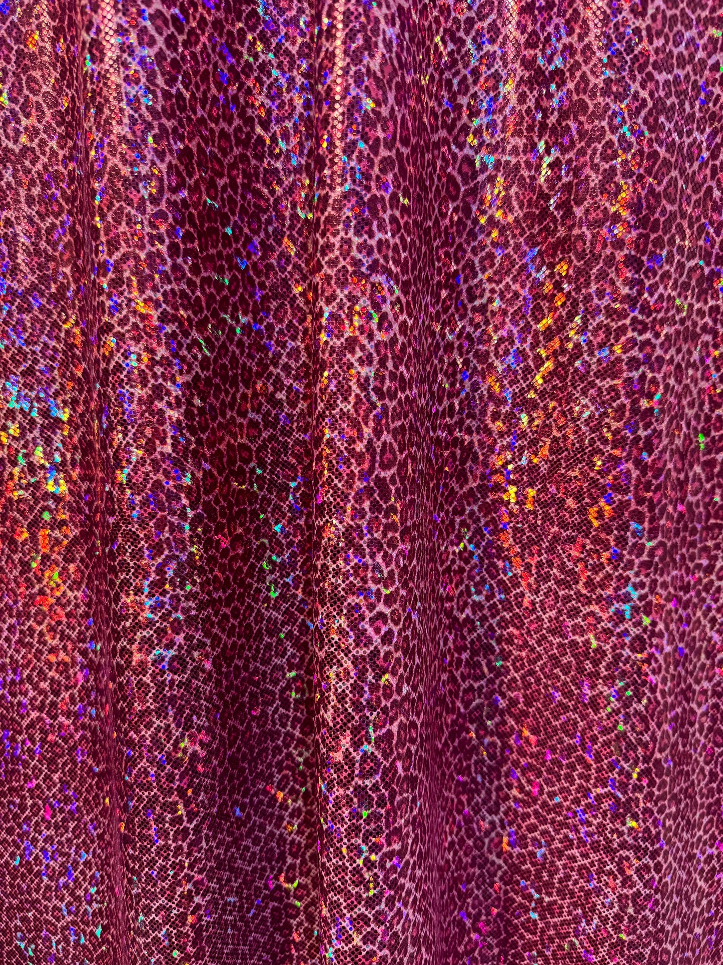 New tiny cheetah design print on nylon spandex hologram metallic 4-way stretch 58/60”Sold by the YD.Ships worldwide from Los Angeles CA.